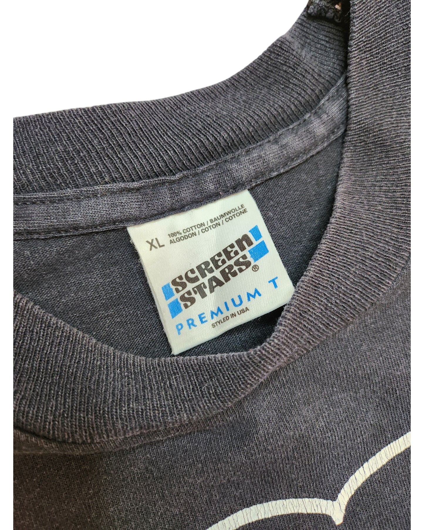 Close-up of a gray T-shirts neckline featuring a label that reads Screen Stars Premium T and states the size as XL. This eco-friendly shirt by touched out mama, called Upcycled Breastfeeding (Nursing) & Pumping Talented Cat t-shirt, is made from 100% cotton in the USA, embodying sustainable fashion.