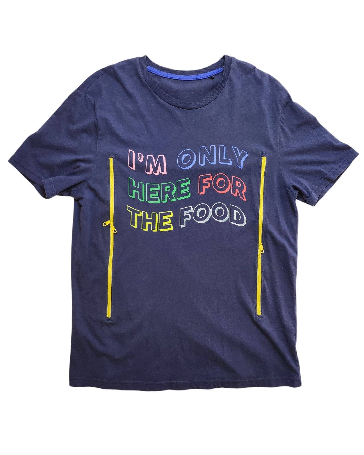 The Upcycled Breastfeeding & Pumping Food T-shirt by touched out mama features IM ONLY HERE FOR THE FOOD in colorful letters, with navy blue fabric and two vertical yellow side zippers—ideal for stylish breastfeeding.