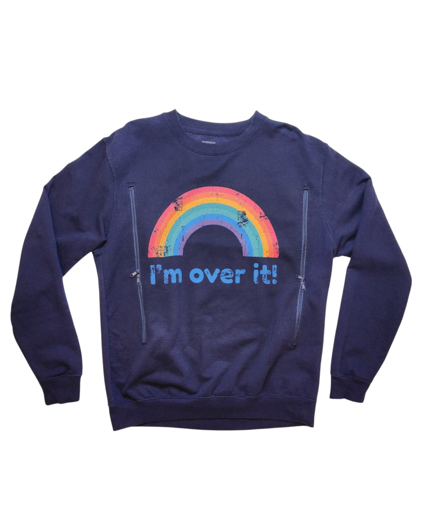 The Upcycled Breastfeeding & Pumping Rainbow Sweatshirt L by touched out mama is a navy blue piece adorned with a vibrant rainbow and Im over it! slogan. Made from upcycled clothing, it offers a vintage aesthetic, marrying eco-friendly fashion with timeless style.