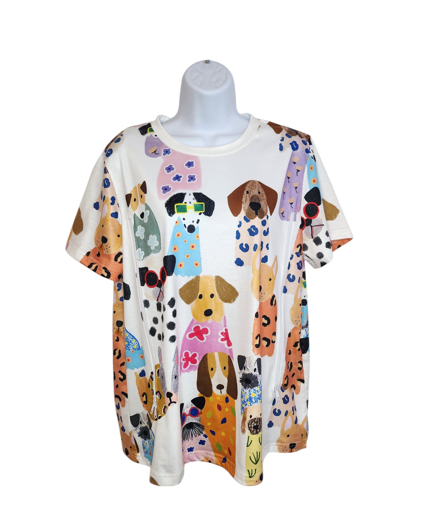 An upcycled T-shirt, named Upcycled Breastfeeding (Nursing) & Pumping Dogs T-shirt L by touched out mama, showcased on a mannequin, features a vibrant cartoon-style dog design with unique patterns and accessories against a white background.