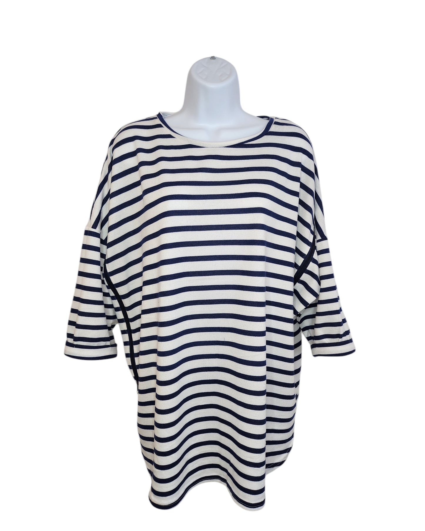 The preloved Upcycled Breastfeeding & Pumping Stripe Knit Top L by touched out mama is showcased on a white mannequin torso. This black and white top boasts three-quarter sleeves, a relaxed fit, and classic horizontal stripes for everyday comfort.