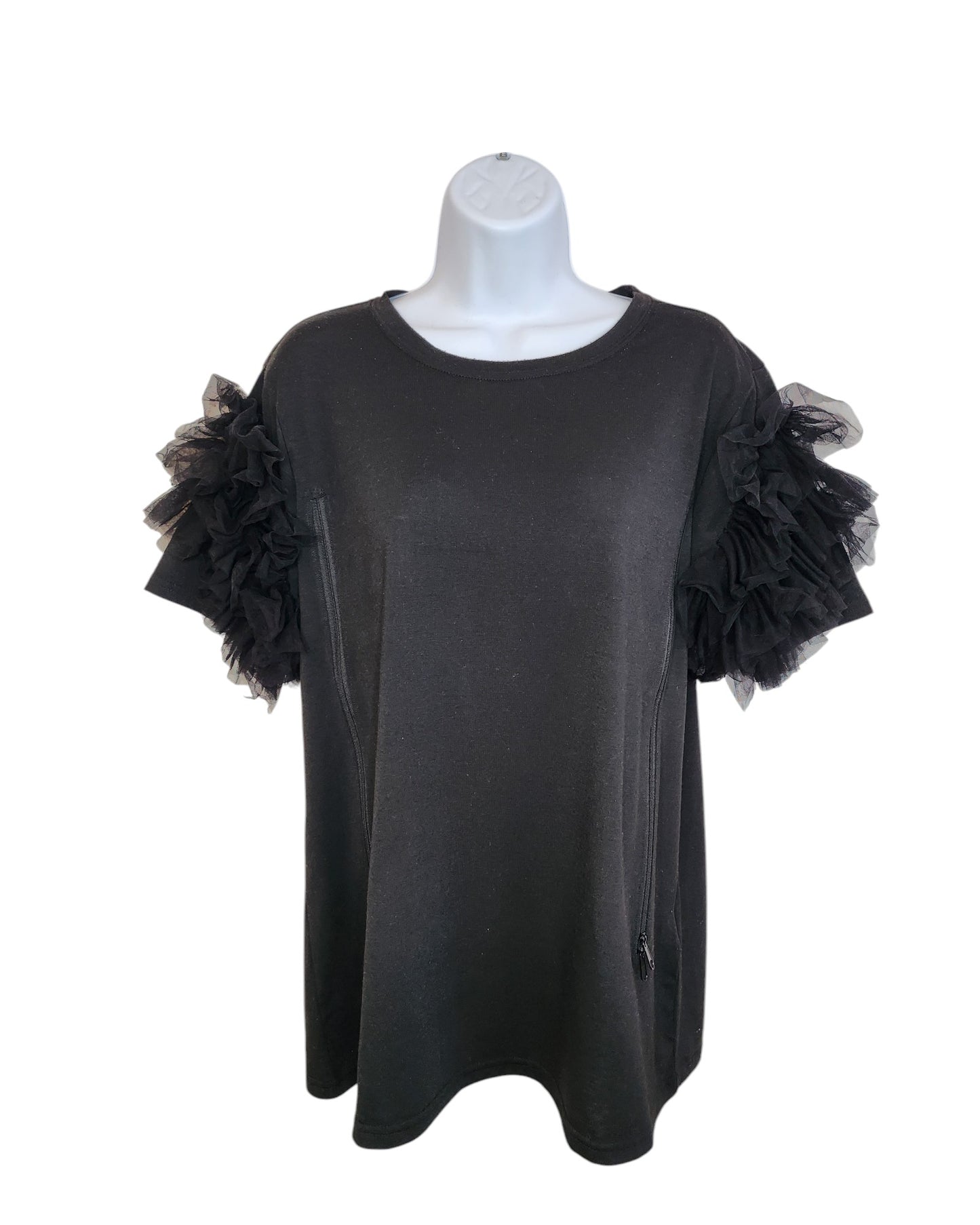 The Upcycled Breastfeeding & Pumping Black Tulle T-shirt UK14 by touched out mama features decorative ruffled tulle sleeves. Showcased on a mannequin against a white backdrop, this sustainable and chic garment combines eco-friendly design with stylish practicality.