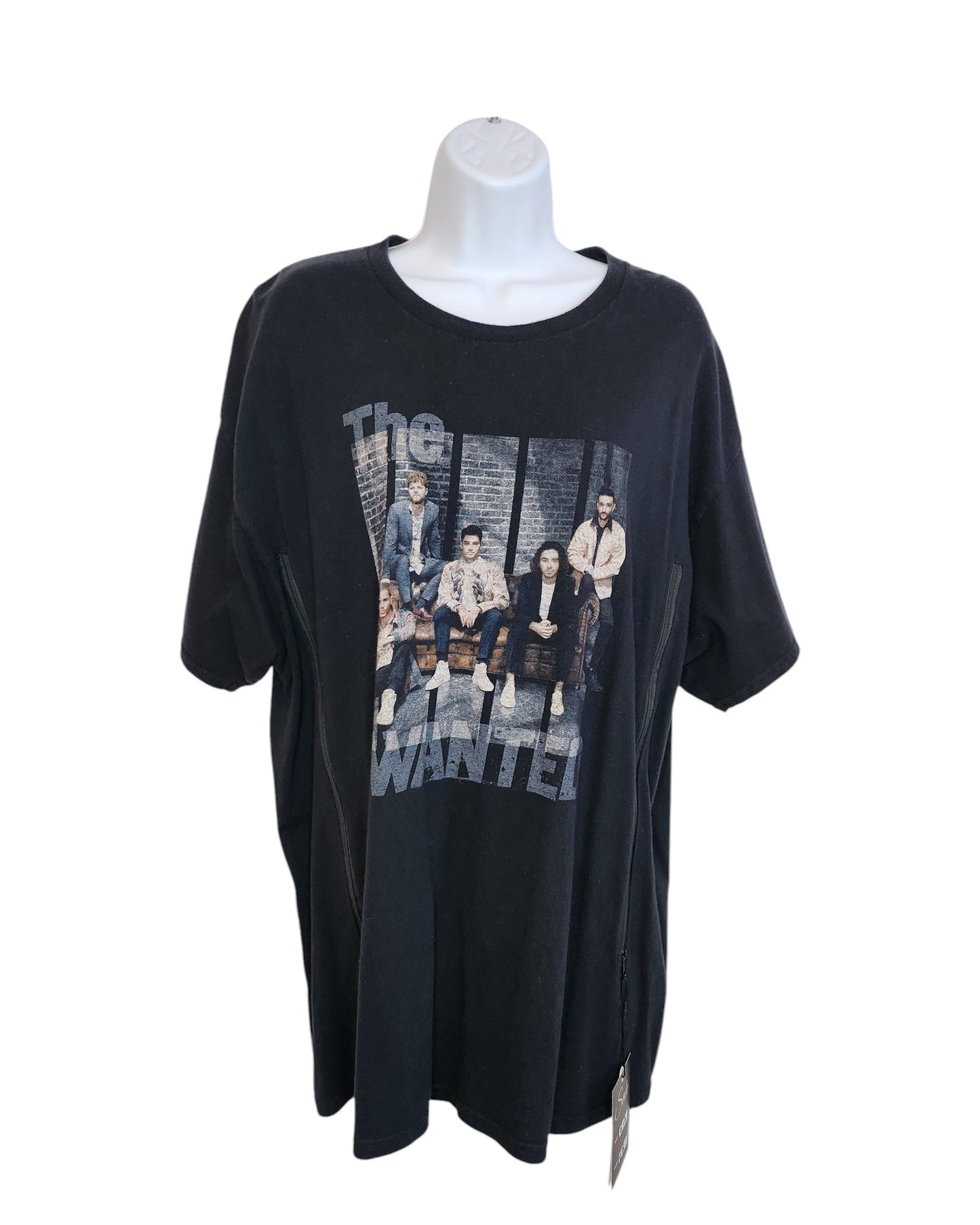 Displayed on a mannequin, this preloved black T-shirt by touched out mama in size XL features a graphic of five men with the text The Wanted. Originally designed as an Upcycled Breastfeeding & Pumping tee.