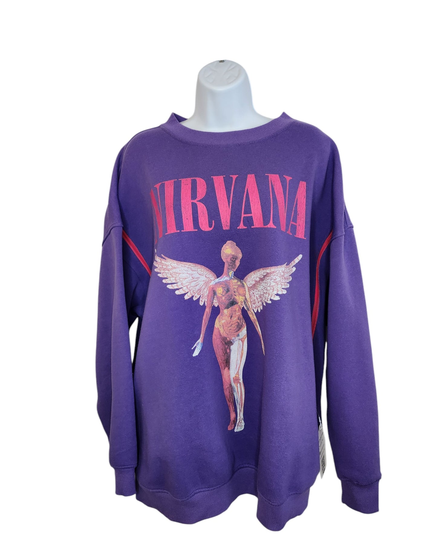 This preloved purple sweatshirt, an Upcycled Breastfeeding & Pumping Nirvana Sweatshirt L by touched out mama, showcases Nirvana in pink above a winged anatomical figure on a mannequin bust.