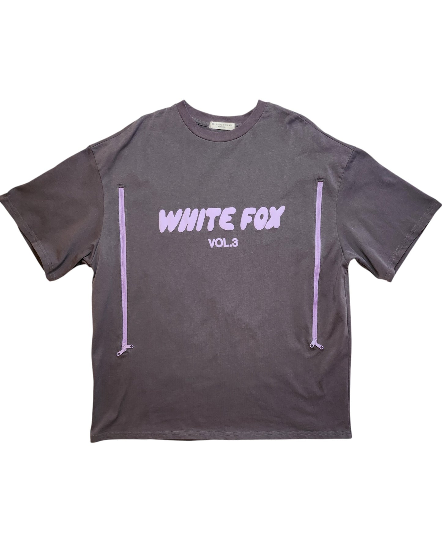 This preloved piece from touched out mama is the Upcycled Breastfeeding (Nursing) & Pumping White Fox T-shirt L featuring the words WHITE FOX VOL.3 in white on dark gray, plus two vertical lavender accents flanking the text for a stylish touch.