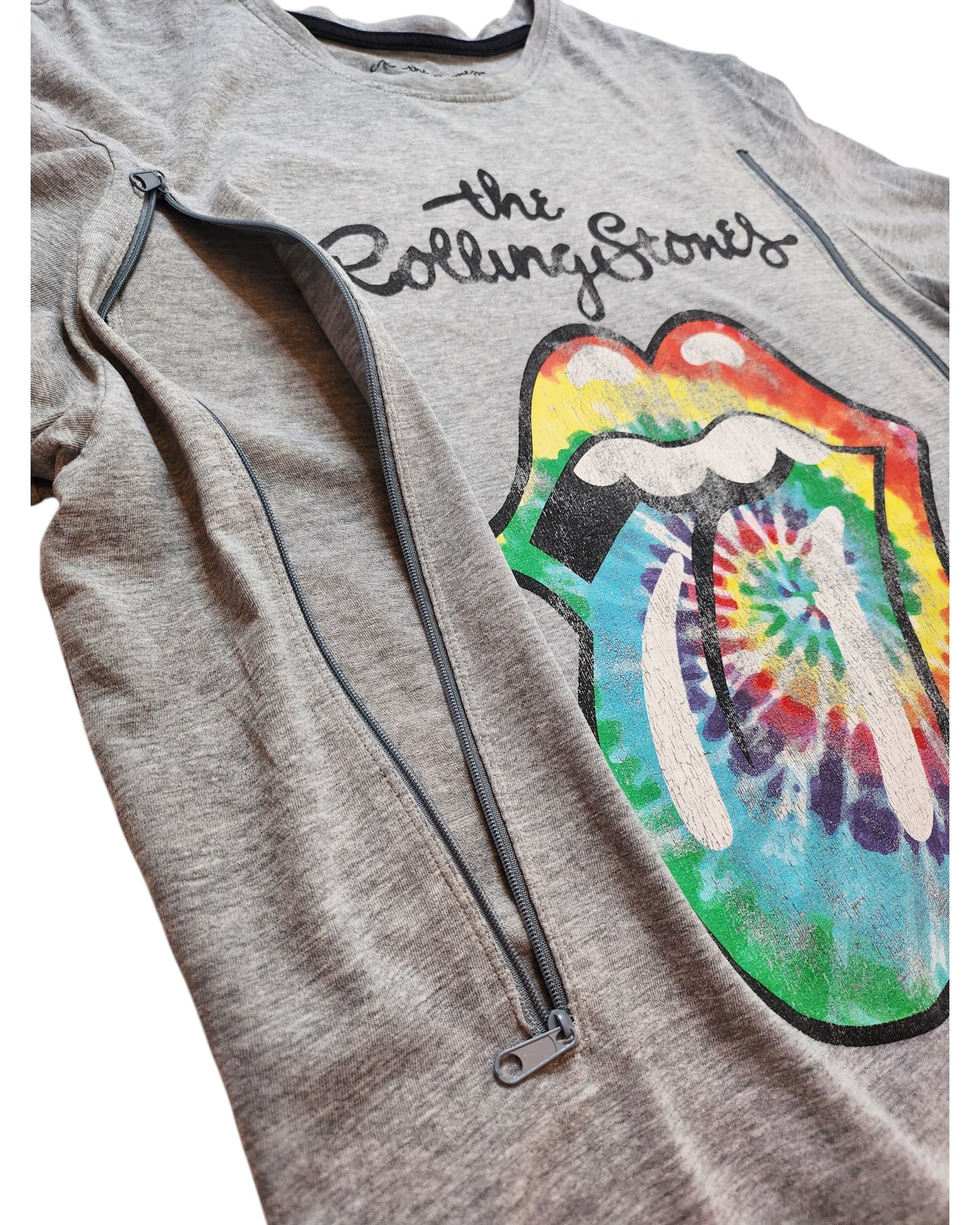 The Upcycled Breastfeeding & Pumping Rolling Stones Tie-dye T-shirt L by touched out mama features a gray, vibrant lip-pattern design with The Rolling Stones text. A diagonal zipper runs stylishly from the bottom left to near the center, merging eco-friendly fashion with rock n roll flair.