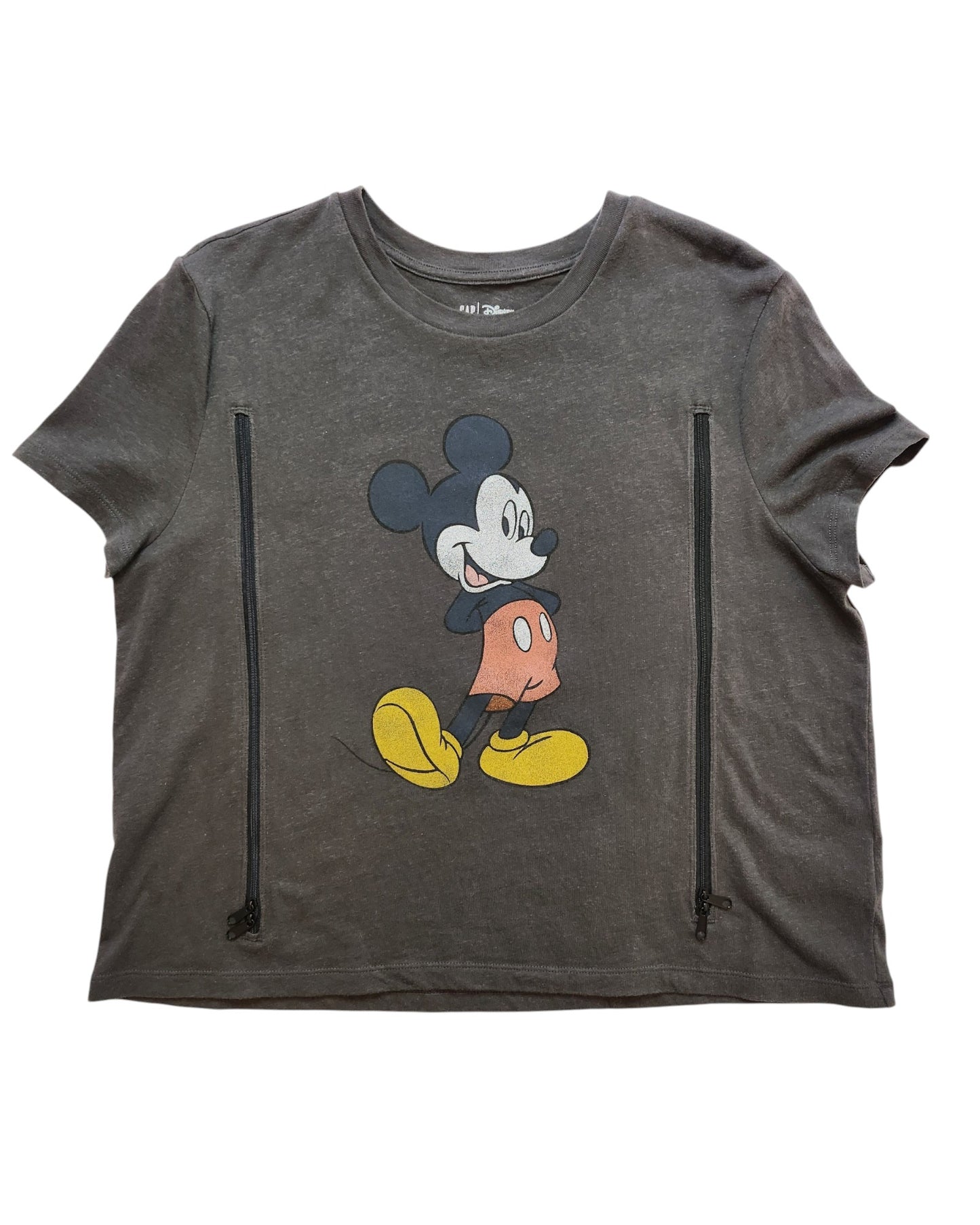 The Upcycled Breastfeeding & Pumping Mickey Mouse Cropped T-shirt L by touched out mama features a centered whimsical print of the iconic character in red shorts and yellow shoes, made from eco-friendly materials for a sustainable style choice.
