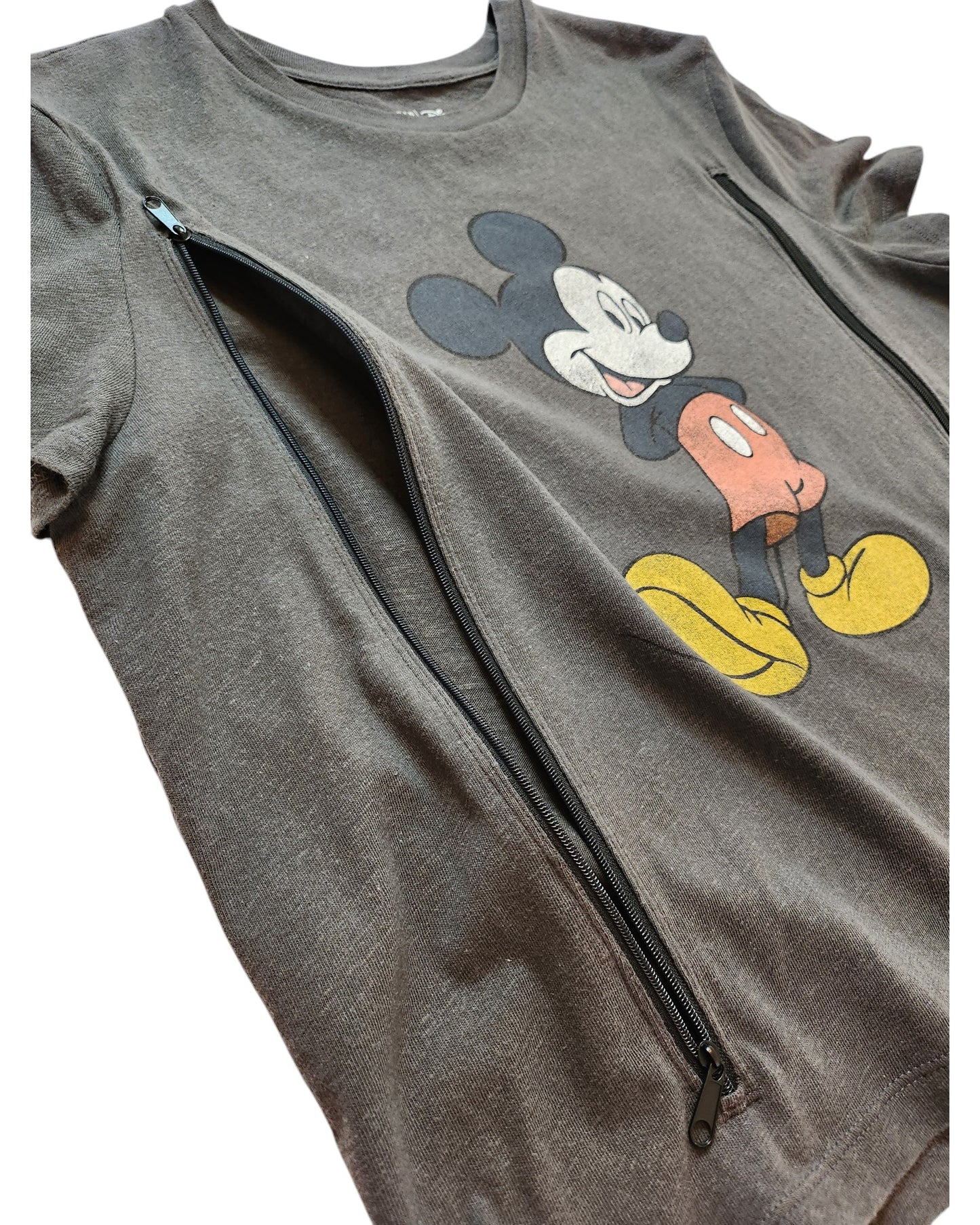 The Upcycled Breastfeeding & Pumping Mickey Mouse Cropped t-shirt L by touched out mama is a stylish gray tee with a cartoon mouse graphic and dual front zippers, ideal for nursing moms. This eco-friendly piece meets practicality with flair while being considerate of you and the planet.