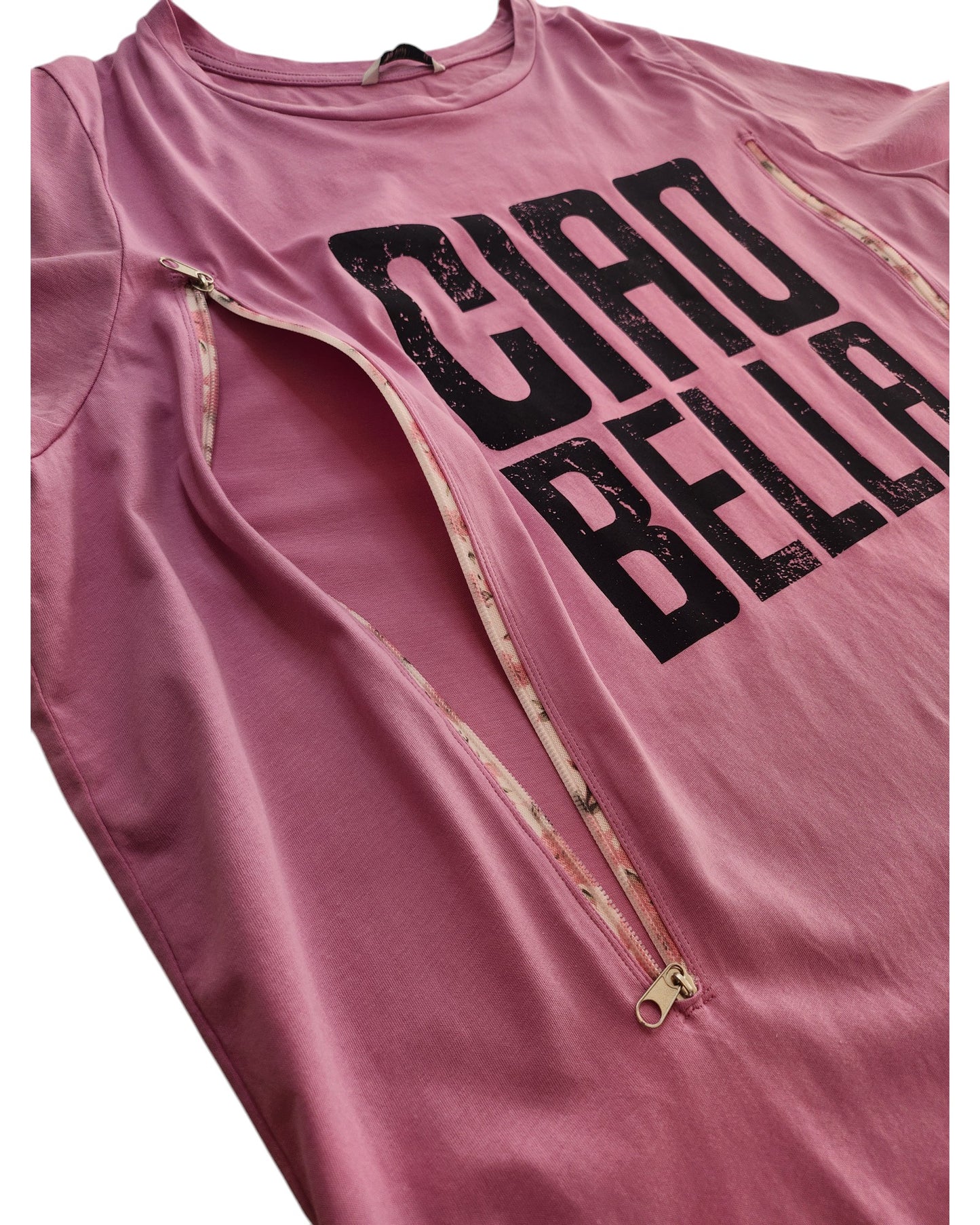 The Upcycled Breastfeeding & Pumping Ciao Bella T-shirt UK22 by touched out mama is a pink, eco-friendly shirt featuring bold black Ciao Bella text and dual zippers for style.