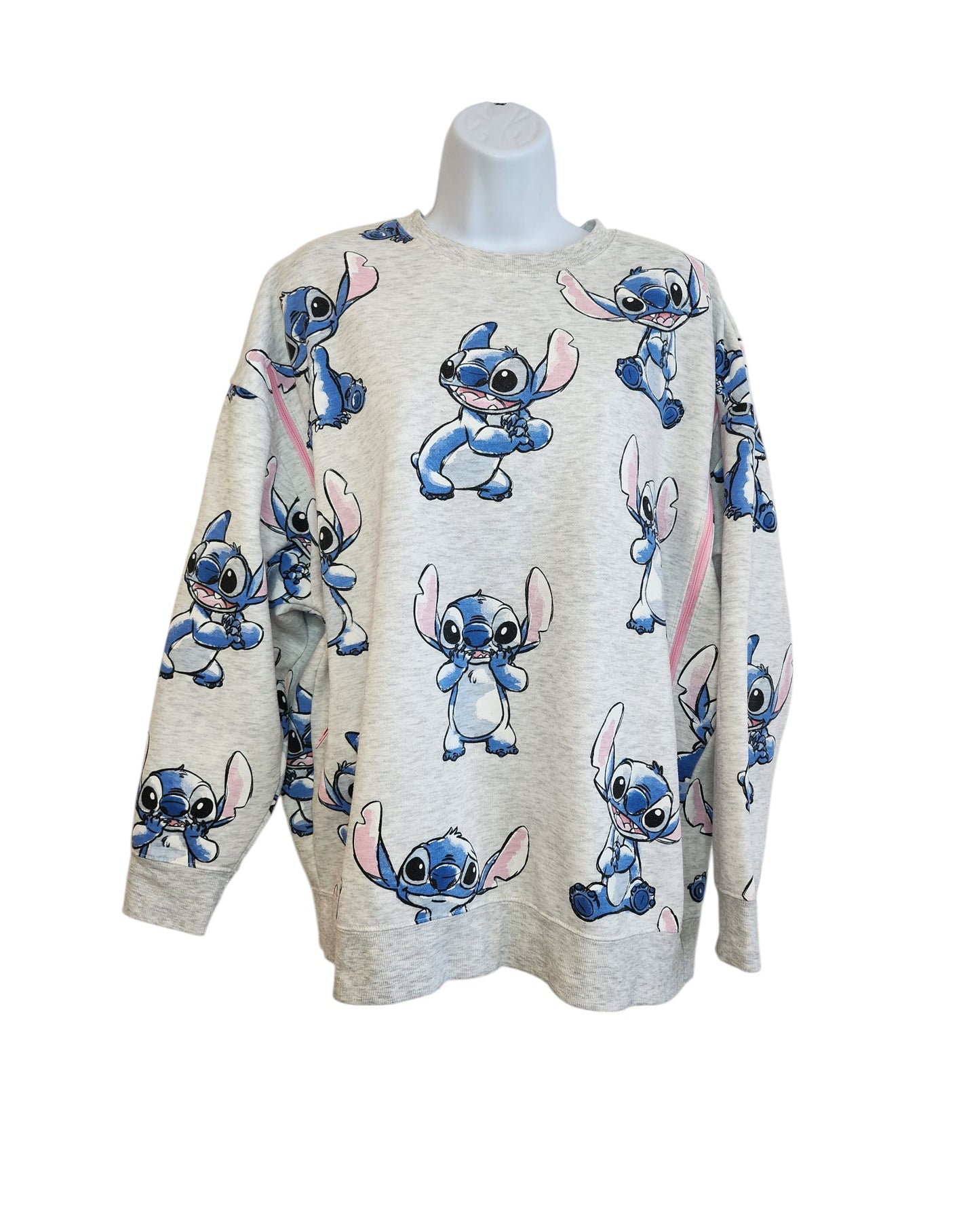 Upcycled touched out mama breastfeeding & pumping Stitch Disney sweatshirt in light gray, size M, featuring multiple prints of Stitch in various poses. Displayed on a white mannequin torso. Preloved condition.