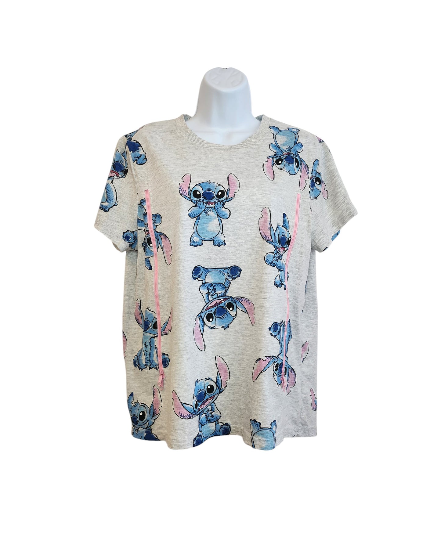 Gray T-shirt with a cartoon blue alien character in various poses, designed by touched out mama. This upcycled breastfeeding and pumping Stitch Disney t-shirt, size M, is displayed on a white mannequin torso against a plain white background.