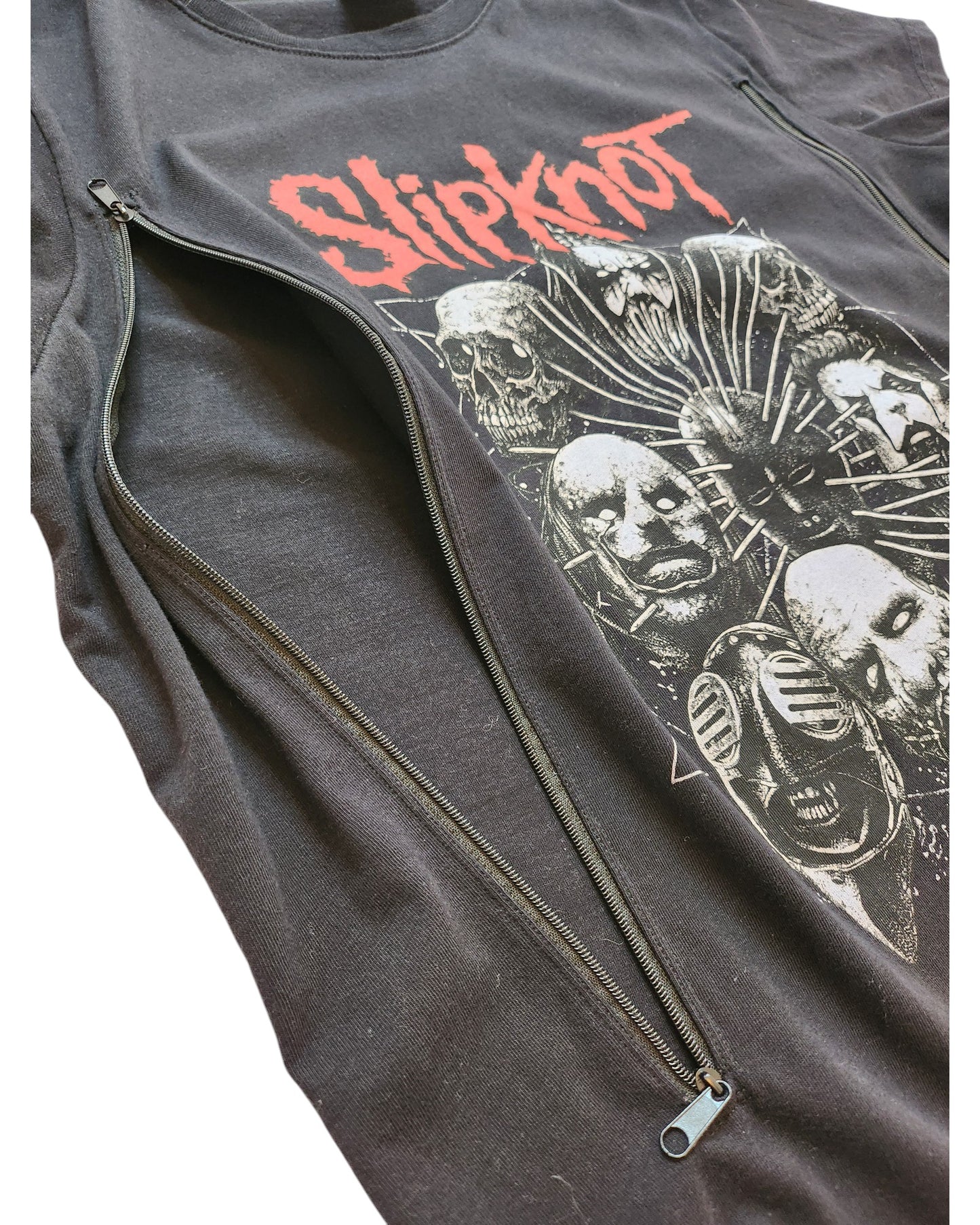 This touched out mama Upcycled Breastfeeding & Pumping Slipknot T-shirt (size L) features band members masked faces and a red logo. It combines edgy fashion with functionality, including a diagonal shoulder zipper for sustainable style with iconic flair.