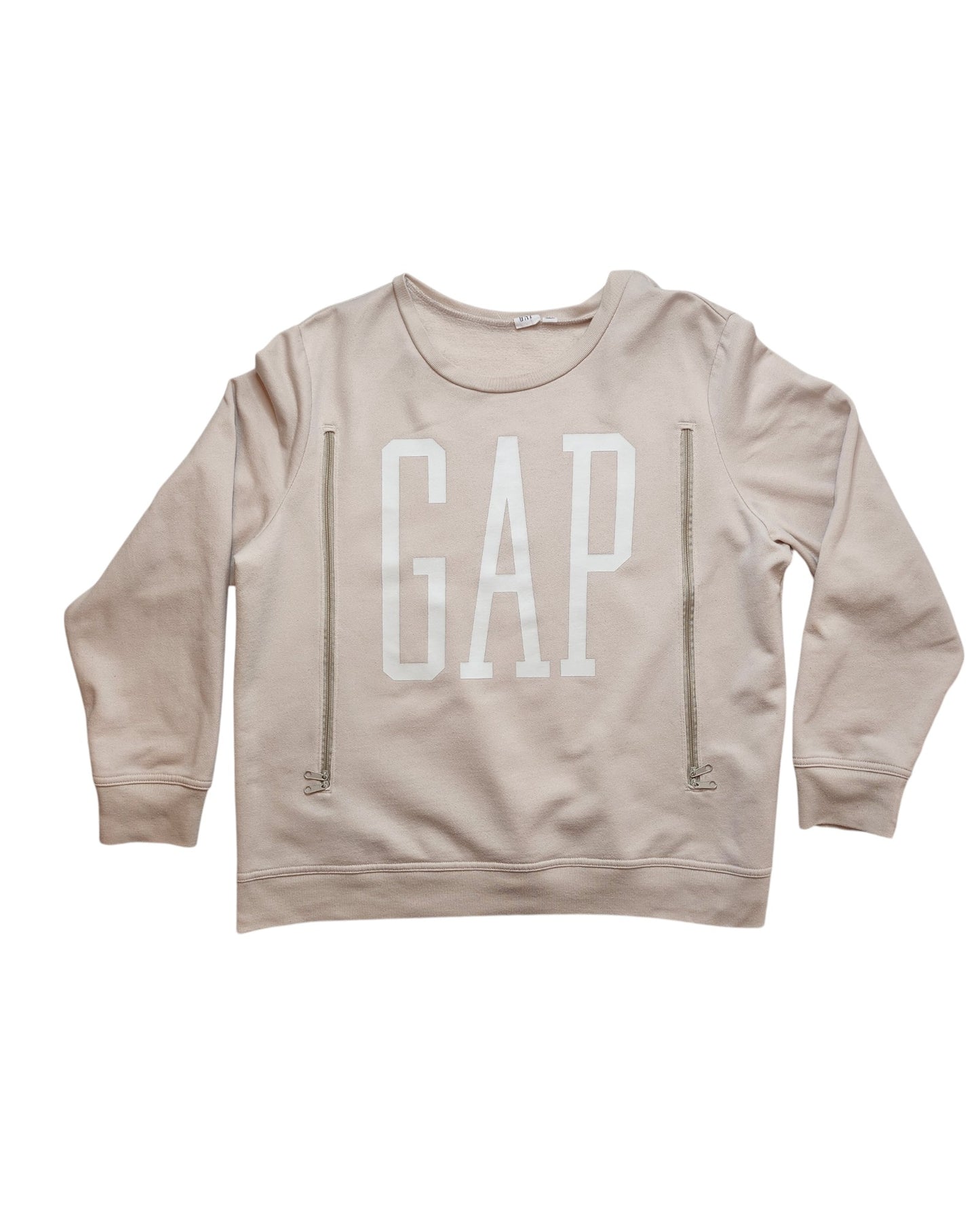 The Upcycled Breastfeeding & Pumping Cream GAP Sweatshirt L by touched out mama features a round neckline, long sleeves, large white GAP lettering, and unique vertical zipper details—ideal for those seeking stylish preloved finds.