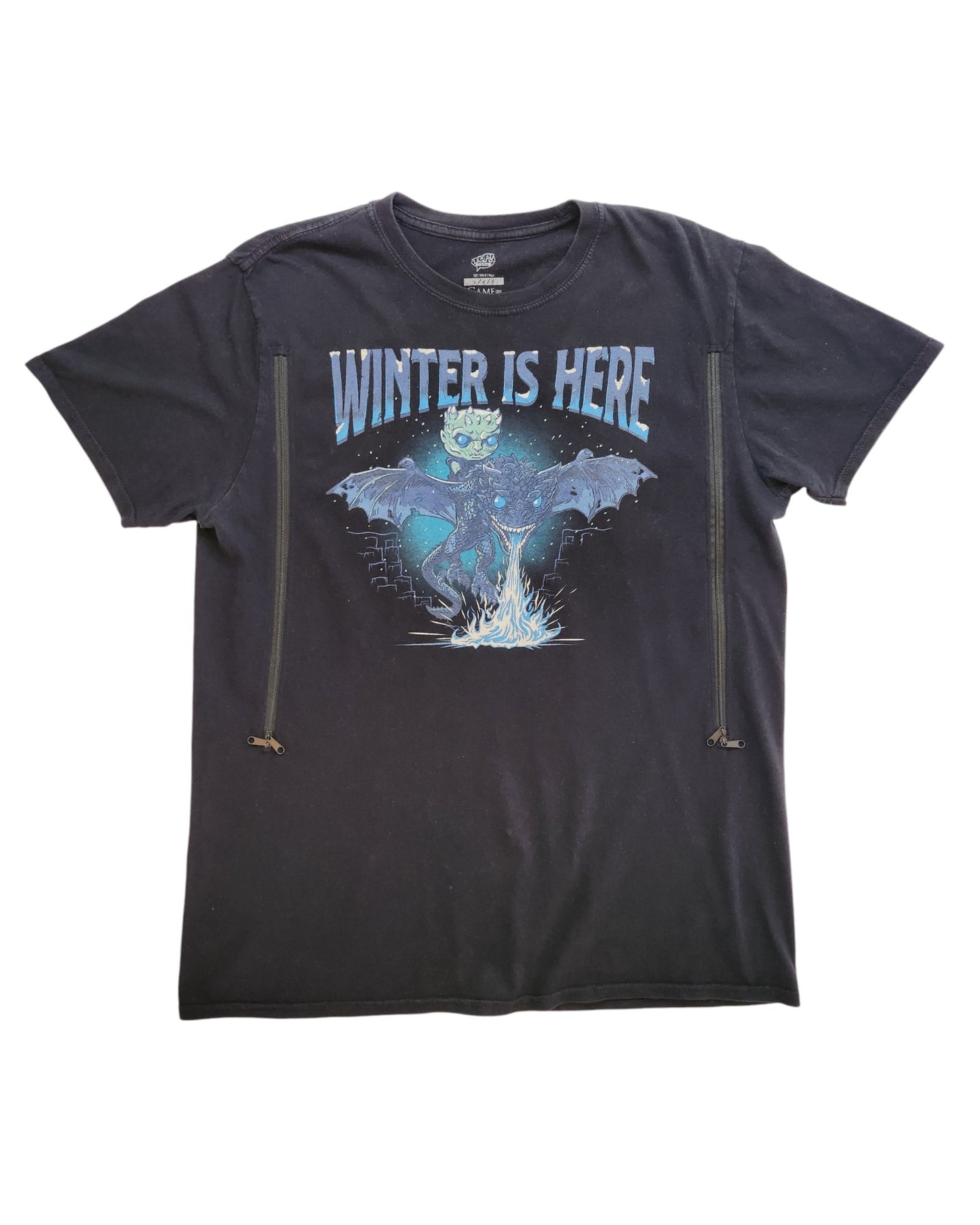 The Upcycled Breastfeeding & Pumping Game of Thrones t-shirt L by touched out mama features a blue icy figure and dragon graphic with Winter Is Here text, plus two front zippers. Eco-friendly design for nursing moms.