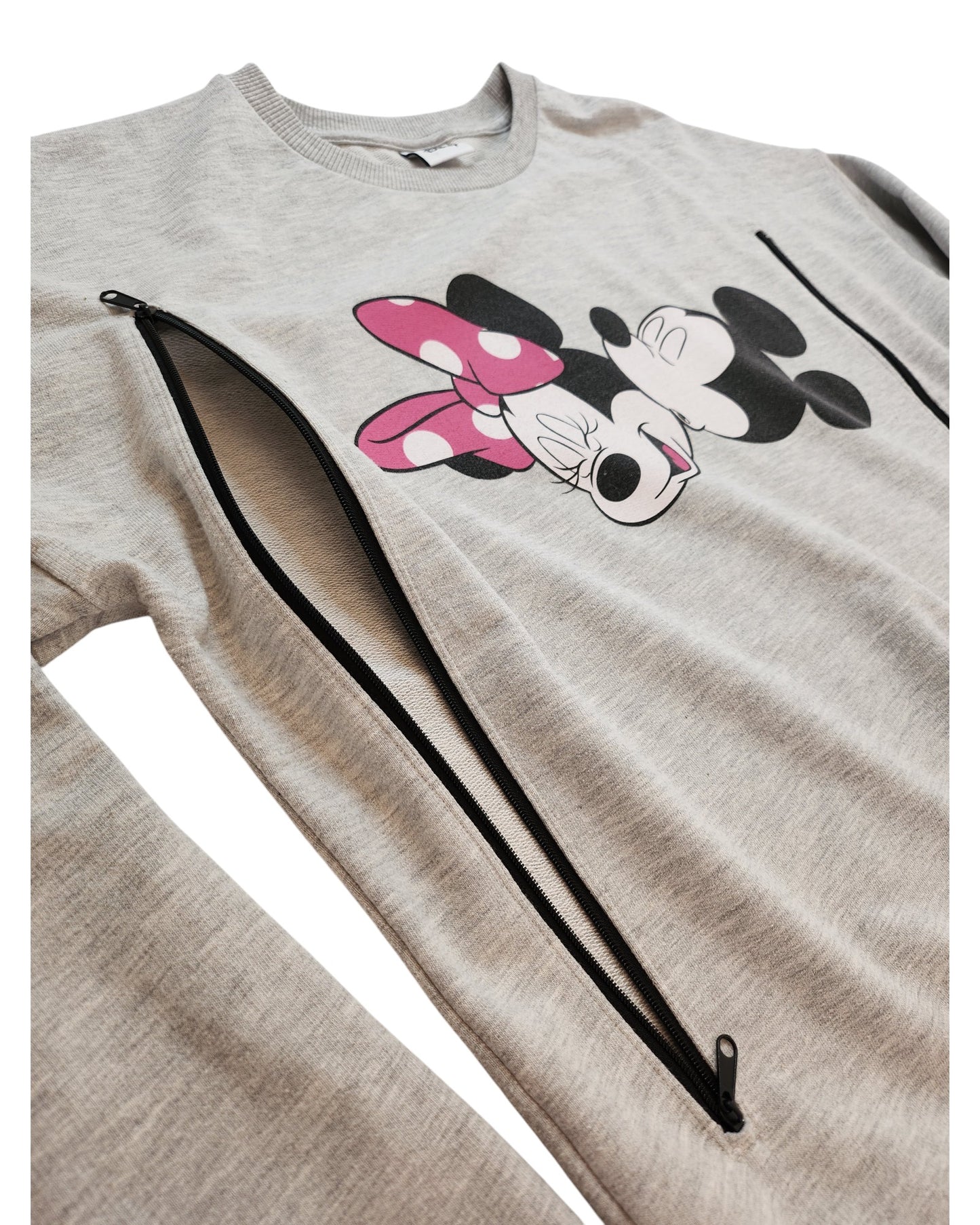 The touched out mama Upcycled Breastfeeding & Pumping Minnie & Mickey Sweatshirt UK14 is a gray piece crafted from preloved clothing, featuring a pink bow-wearing cartoon character with closed eyes and unique diagonal front zippers for an eco-friendly wardrobe addition.