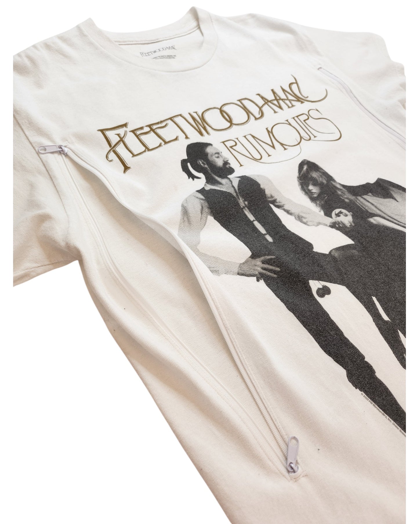 The touched out mama Upcycled Breastfeeding & Pumping Fleetwood Mac White T-shirt (M) features album cover art, gold logo, two diagonal zippers for easy nursing or pumping—an eco-friendly pick from our upcycled collection.