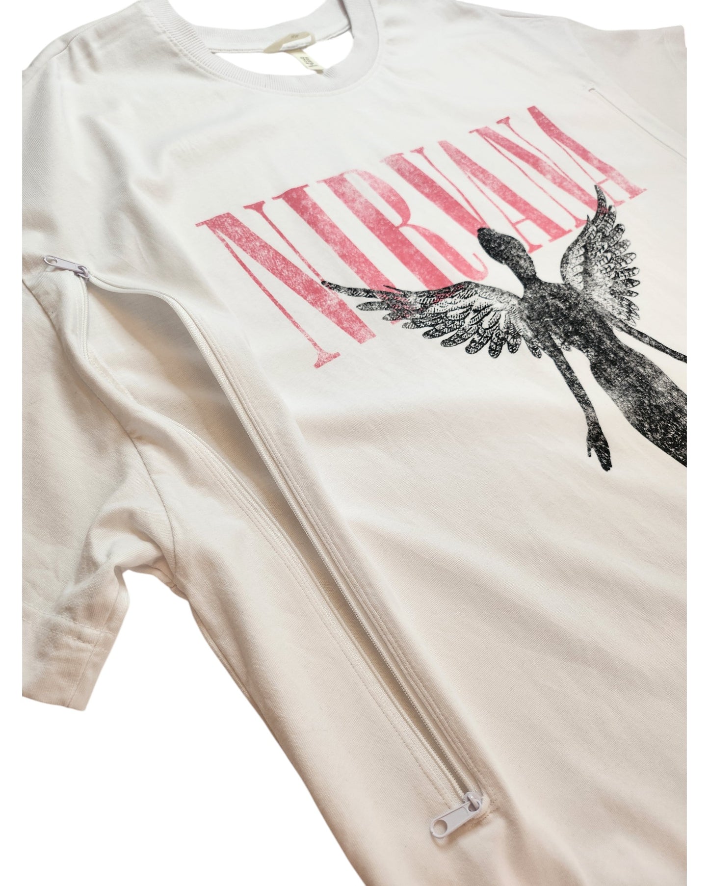 The touched out mama Upcycled Breastfeeding & Pumping White Nirvana T-shirt (3XL) boasts a pink Nirvana text, black angel graphic, and a stylish side zipper crafted with upcycled techniques for an eco-friendly fashion statement.