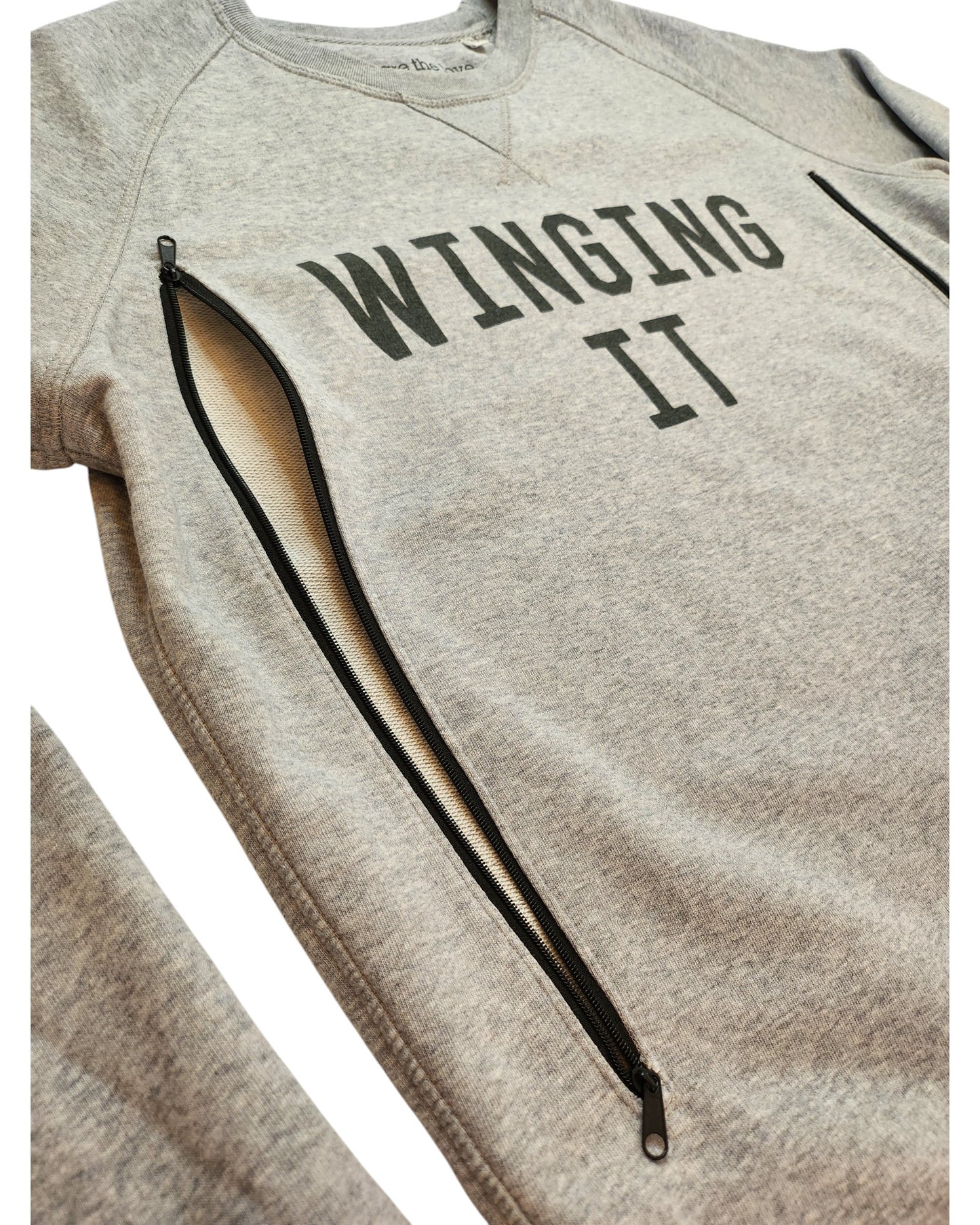 The touched out mama Upcycled Breastfeeding & Pumping Winging It Sweatshirt XL is a gray, affordable option with black text and diagonal zippers for easy nursing—ideal for comfort and style.