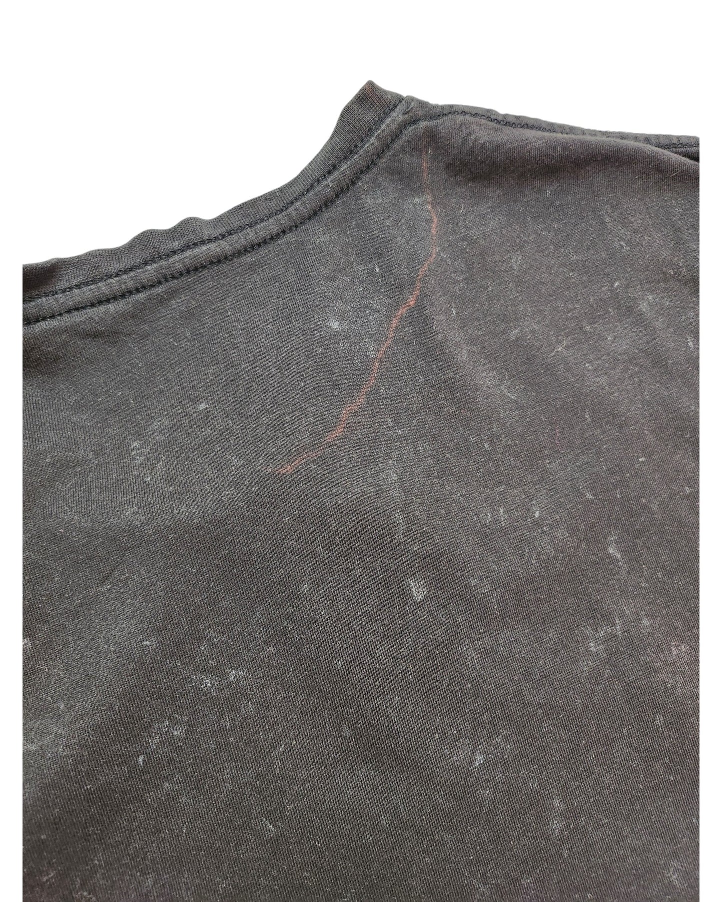 The Upcycled Breastfeeding (Nursing) & Pumping Britney T-shirt M from touched out mama features a dark gray fabric with a subtle marbled texture. A faint reddish diagonal line near the collar adds character, and the material is soft with a slightly worn appearance.