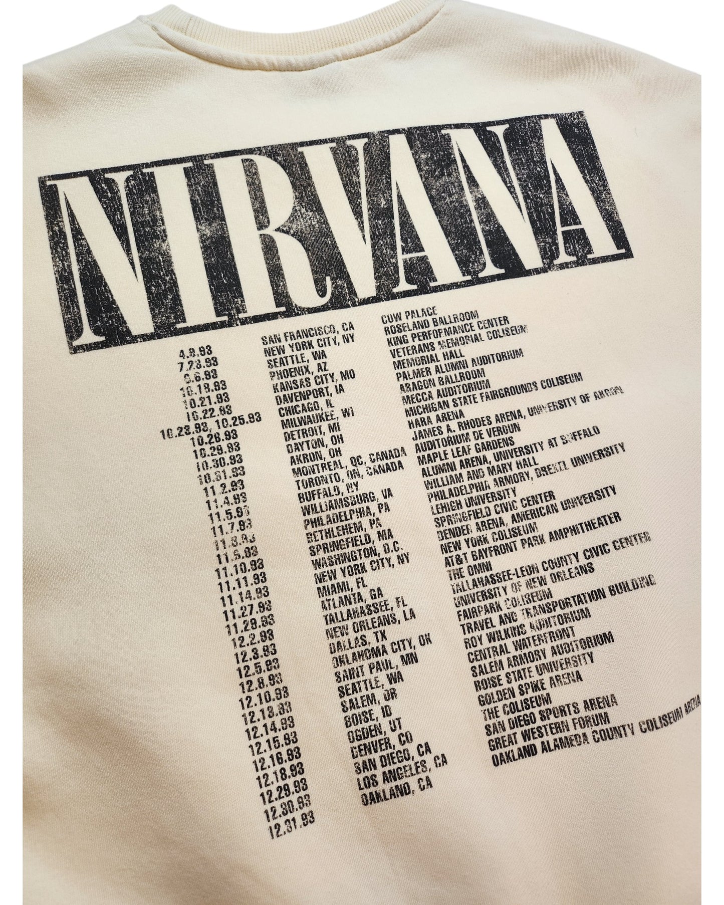 The touched out mama Upcycled Breastfeeding (Nursing) & Pumping Cream Nirvana Sweatshirt L features a stylized NIRVANA design with 1988–1989 tour dates and cities in black, crafted from upcycled clothing for an eco-friendly touch.