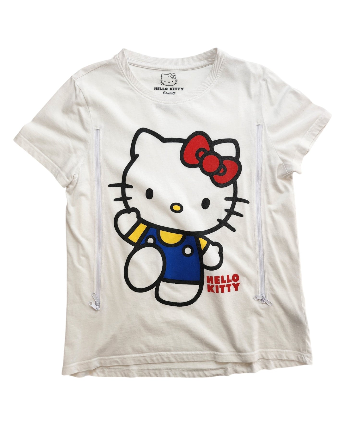 Primark Upcycled Breastfeeding & Pumping White Hello Kitty T-shirt (S, UK10/12) features short sleeves, a large Hello Kitty in blue with a red bow, and two vertical zippers—perfect for stylish new moms and fans alike!.