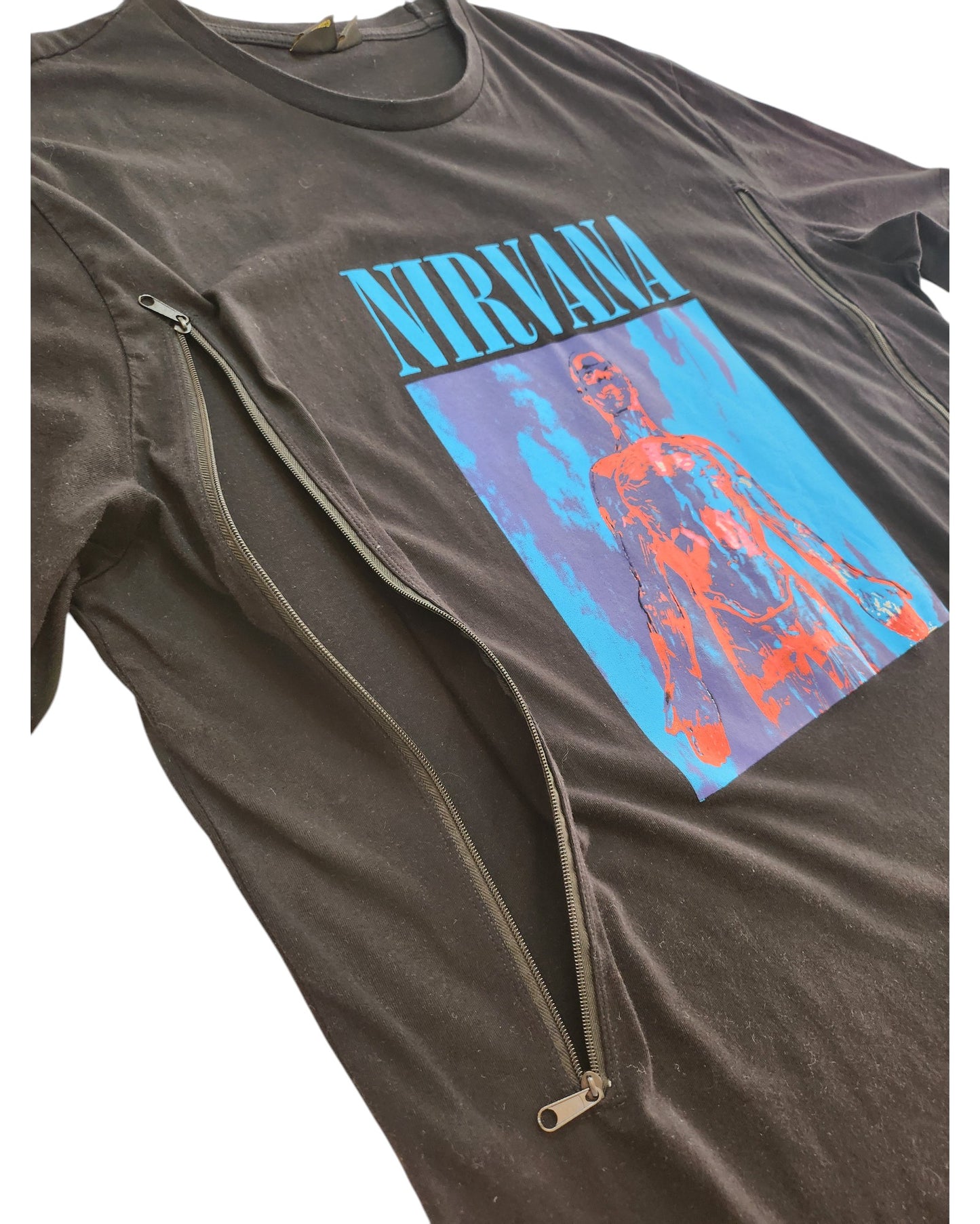 The Primark Upcycled Breastfeeding & Pumping Nirvana Band T-shirt (XL) in black/turquoise features blue NIRVANA text, abstract blue/orange accents, and two diagonal zippers for easy nursing—stylish eco-friendly maternity wear.