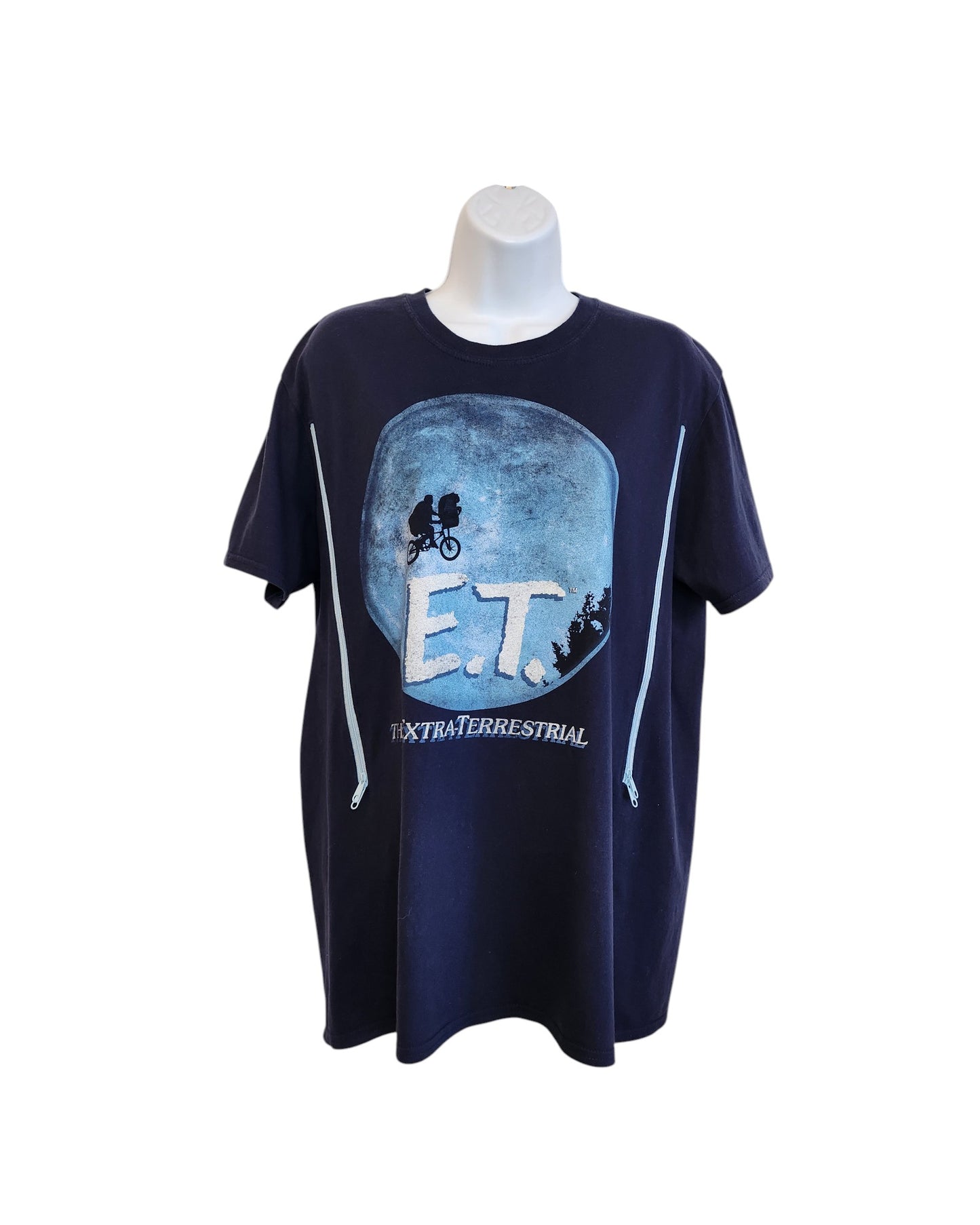 A navy blue upcycled Gildan T-shirt (size L) features an E.T. the Extra-Terrestrial graphic with a large moon, bicycle silhouette, and film title on the front—designed for breastfeeding and pumping fans of preloved clothing.