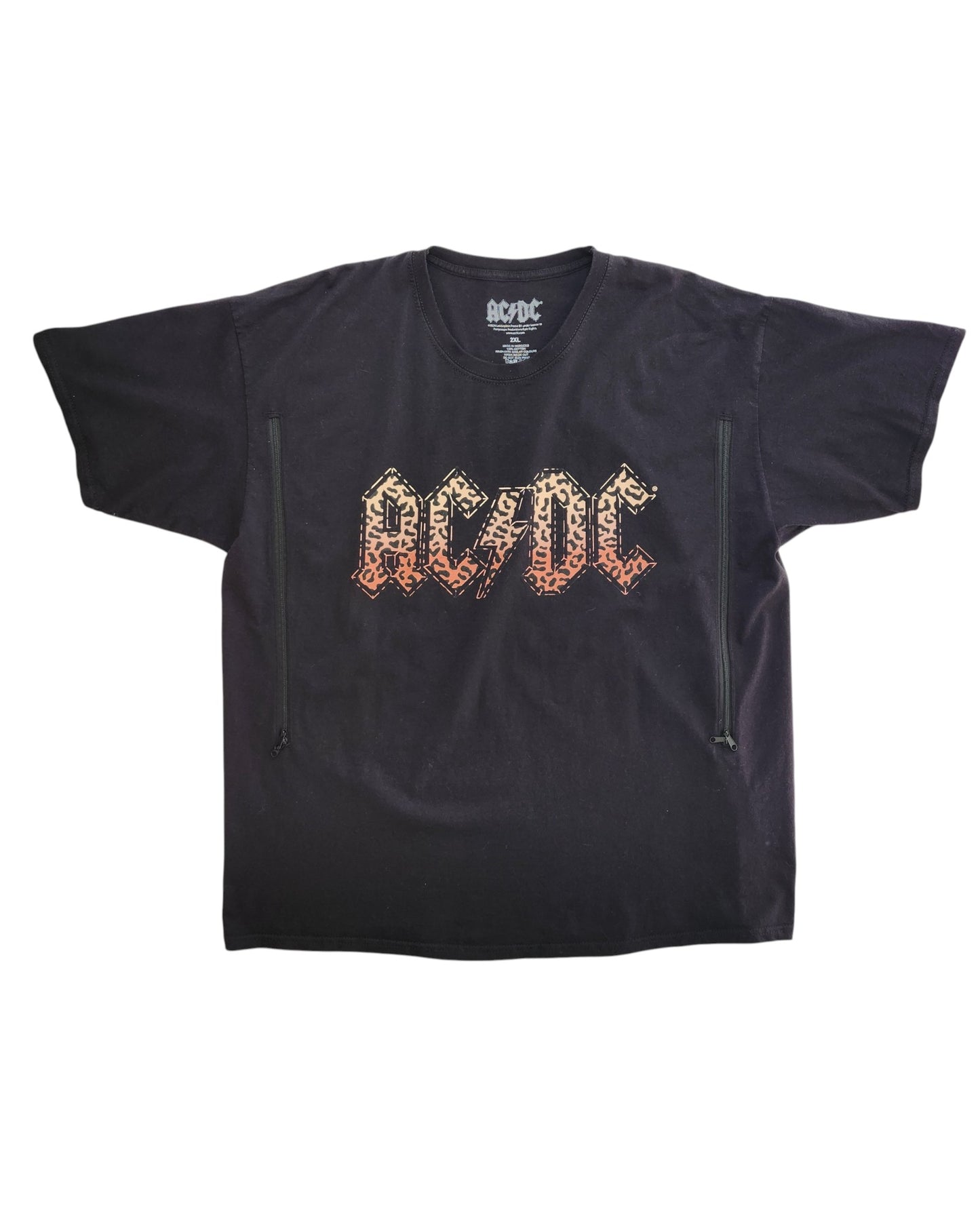 Upcycled AC/DC Leopard Band T-shirt (2XL) reimagined for breastfeeding and pumping, featuring bold center print and two side zippers—ideal for fans of unique, preloved fashion.