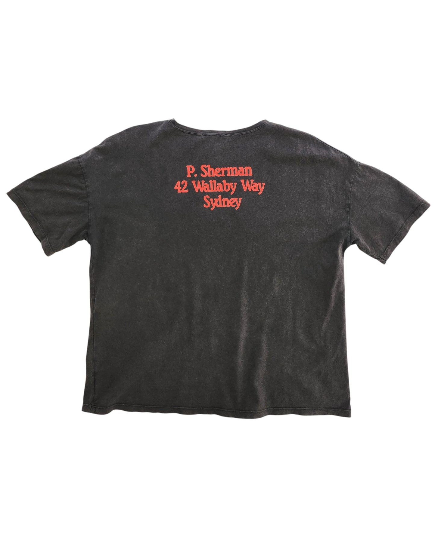 An upcycled ZARA Nursing & Pumping Nemo t-shirt in black, featuring red P. Sherman 42 Wallaby Way Sydney text on the back—a preloved pick for fashion-forward breastfeeding moms.