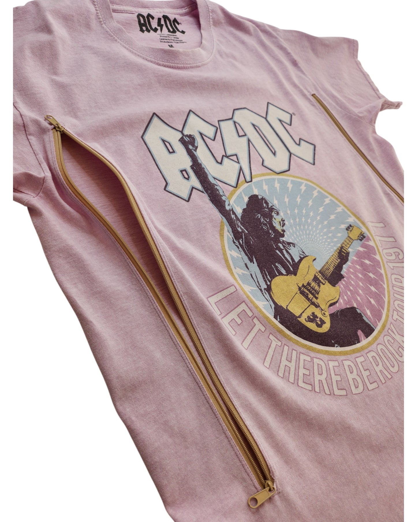 The Upcycled Breastfeeding & Pumping Lilac AC/DC t-shirt (M) by AC/DC is crafted from eco-friendly upcycled clothing, perfect for nursing moms with stylish comfort.