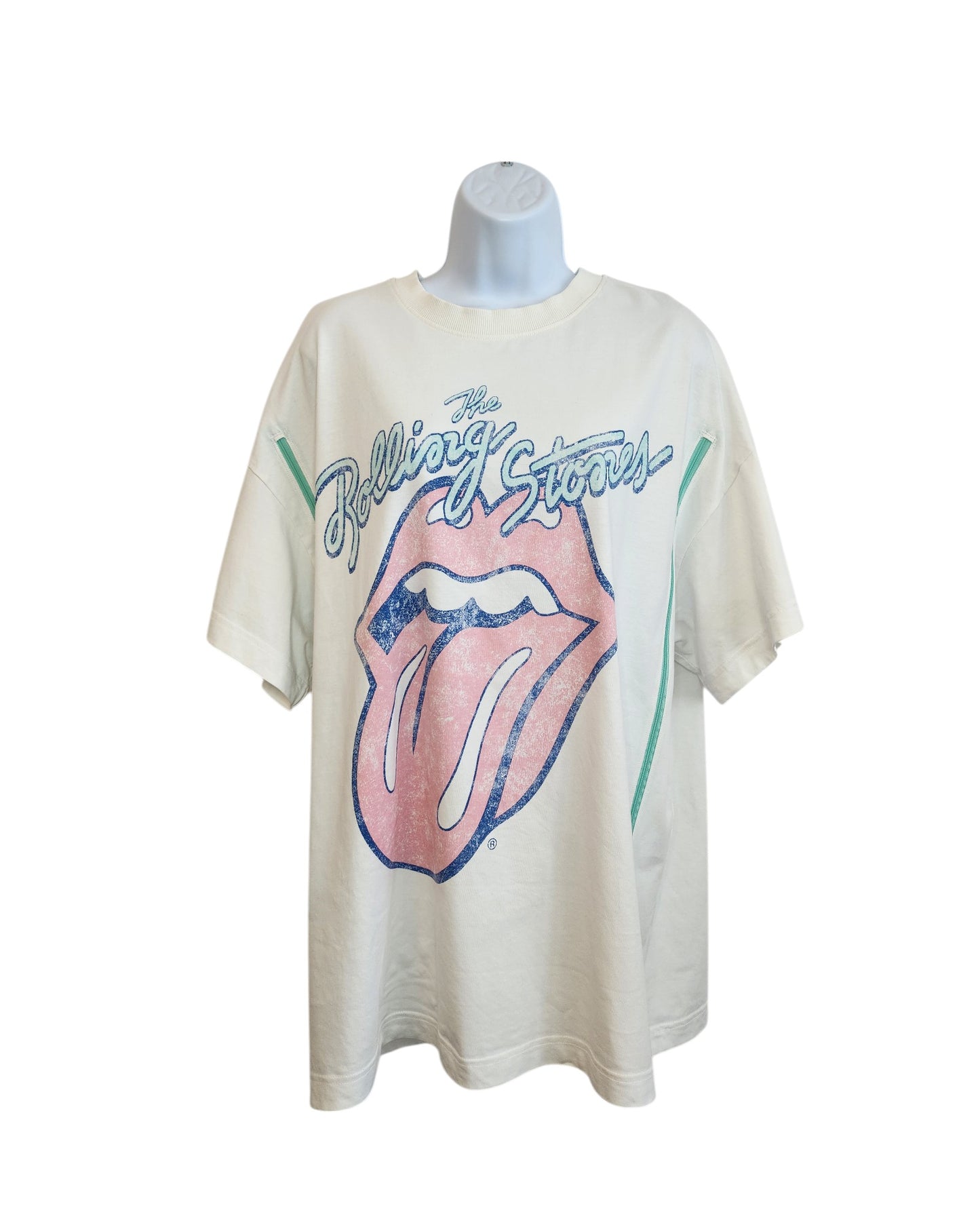 An upcycled H&M white breastfeeding/pumping T-shirt (size L) features a bold Rolling Stones logo—pink tongue and lips—with The Rolling Stones in blue script above and green side accents.