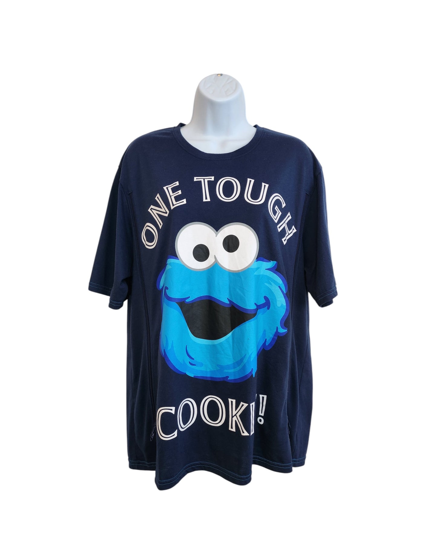 The George Upcycled Breastfeeding & Pumping Cookie Monster T-shirt (L) in navy blue features a bold Cookie Monster face and ONE TOUGH COOK! text. Eco-friendly design shown on a white mannequin torso against a clean, white background.
