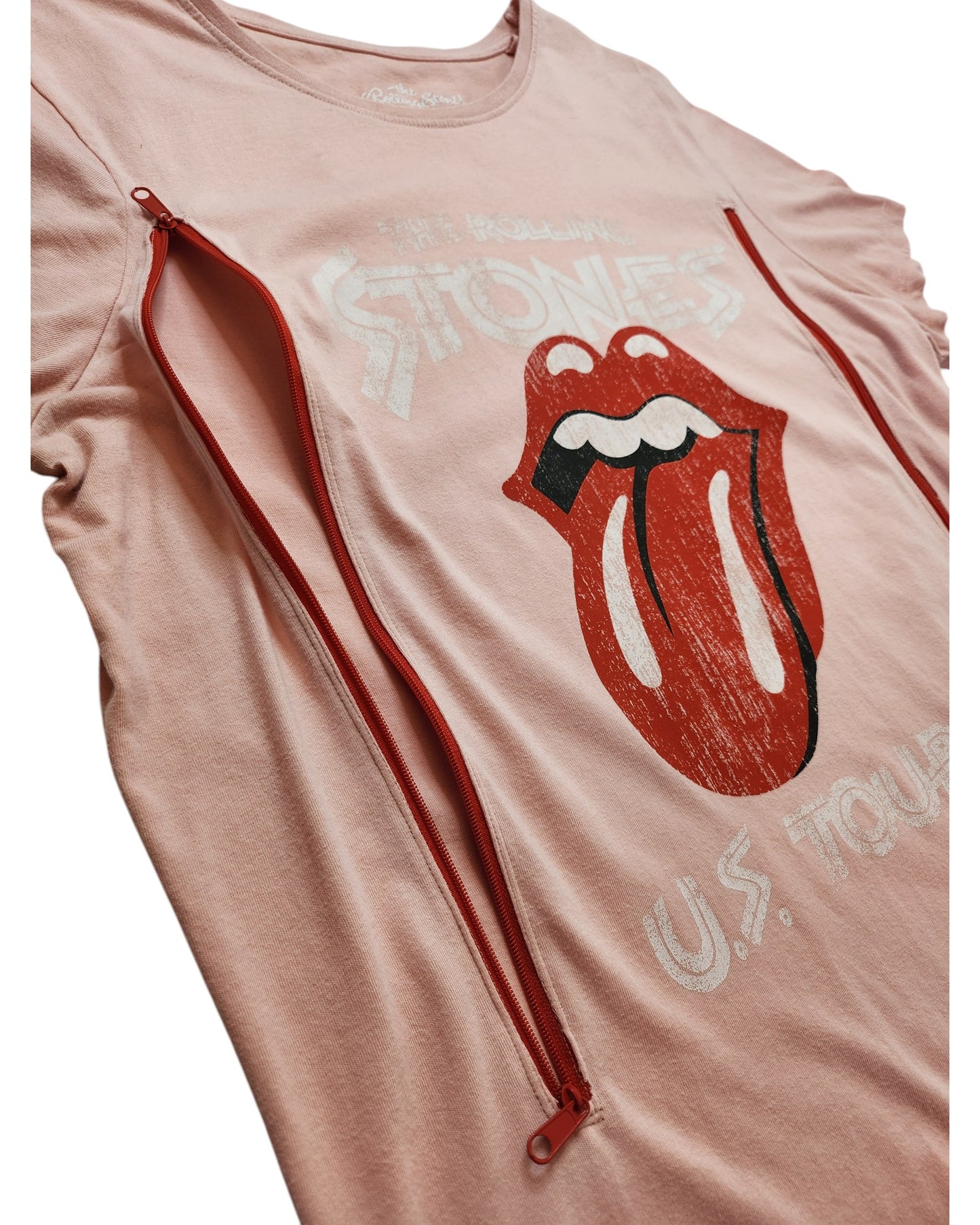 A unique upcycled Tu Pink Rolling Stones Nursing & Pumping T-shirt (UK14) with the tongue logo and two diagonal red zippers for easy access—a stylish, functional twist on the classic band tee.