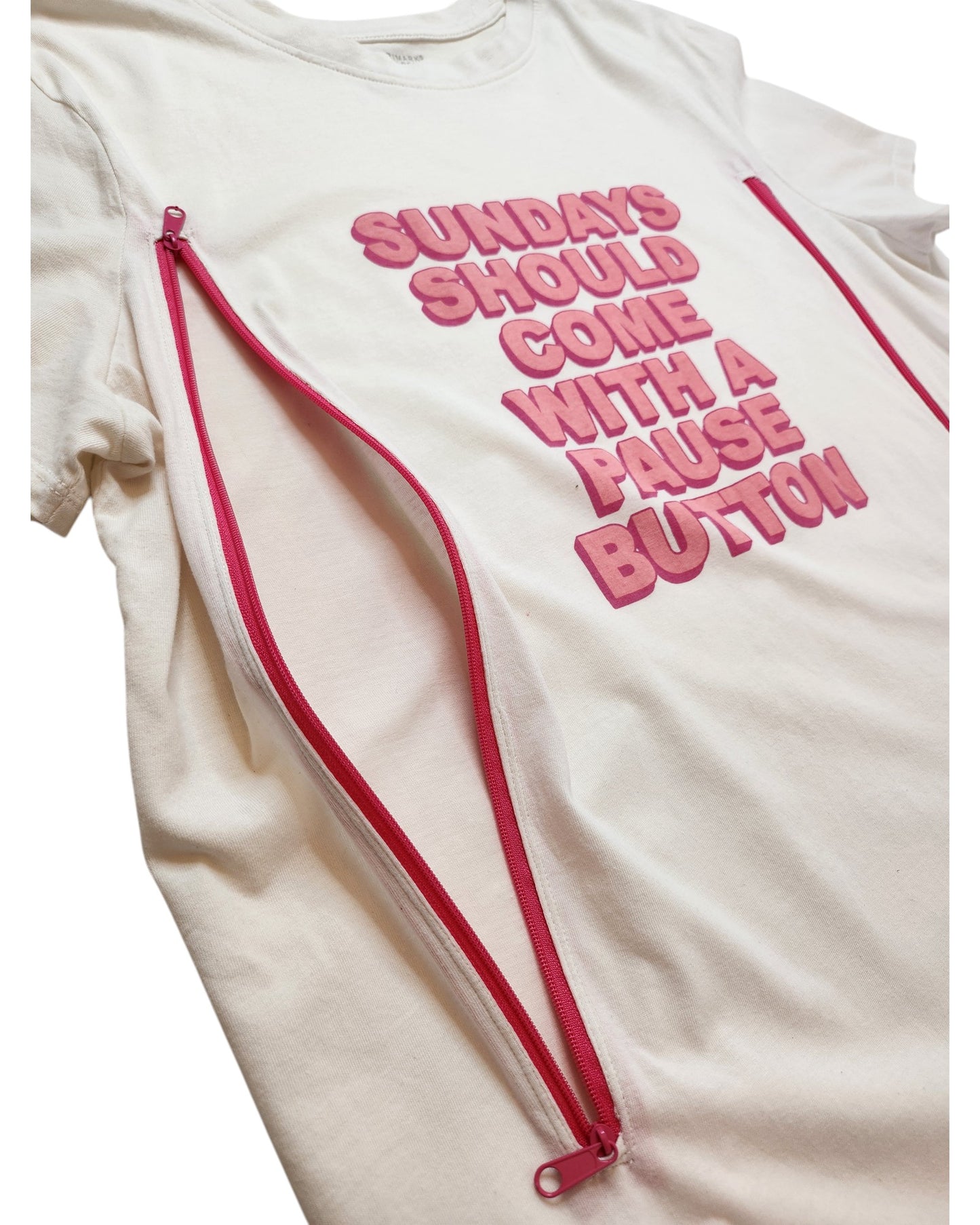 Primark Upcycled Breastfeeding & Pumping Sundays Pause Button t-shirt (L, UK14/16): White tee with pink “SUNDAYS SHOULD COME WITH A PAUSE BUTTON” 3D text and 2 pink zippers for easy nursing. Made from eco-friendly materials.