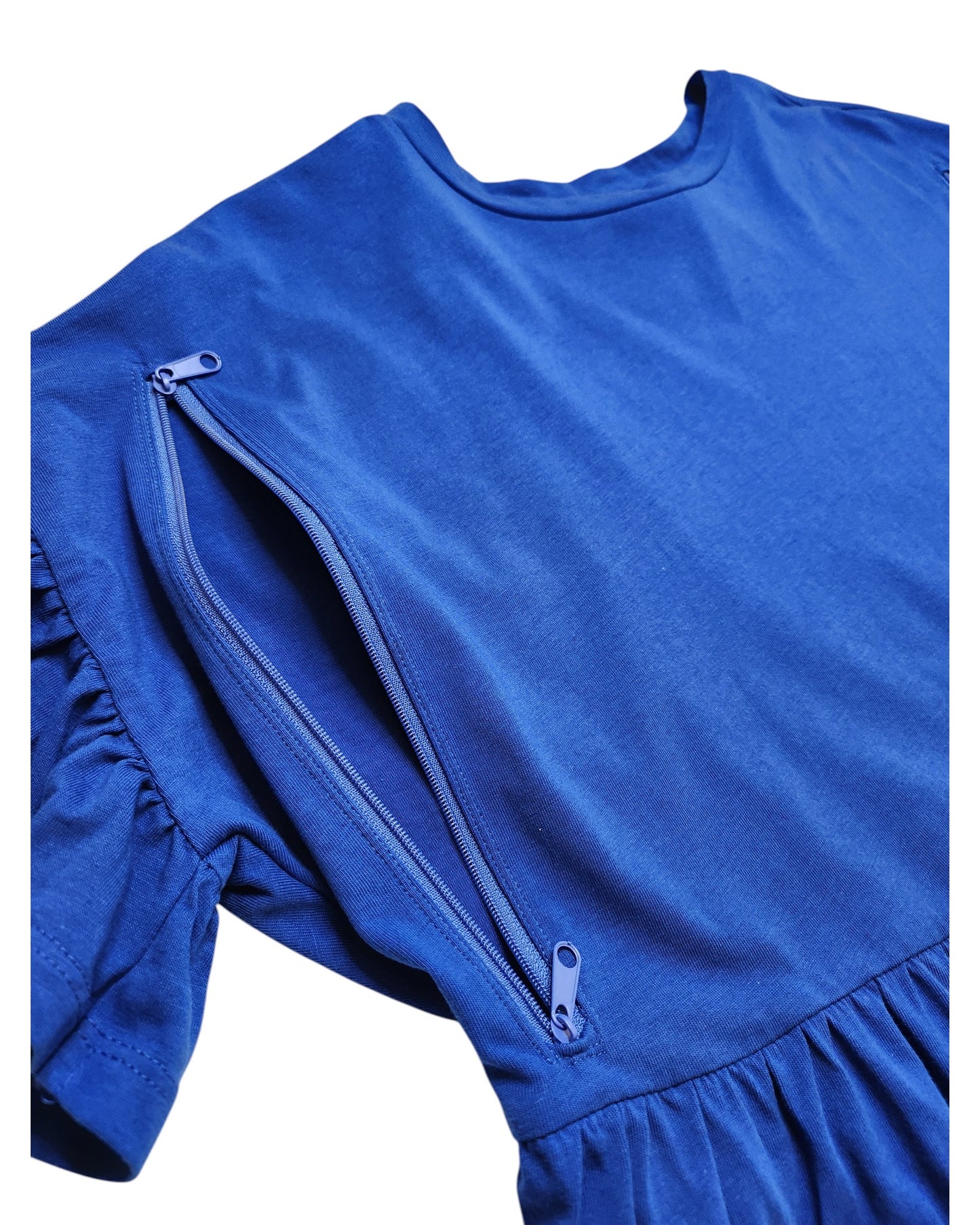 A close-up of the New Look Upcycled Breastfeeding & Pumping Short Blue T-shirt Dress UK10 shows a hidden chest zipper, partially unzipped for nursing access. The soft, slightly gathered waist adds style and practicality for mothers.