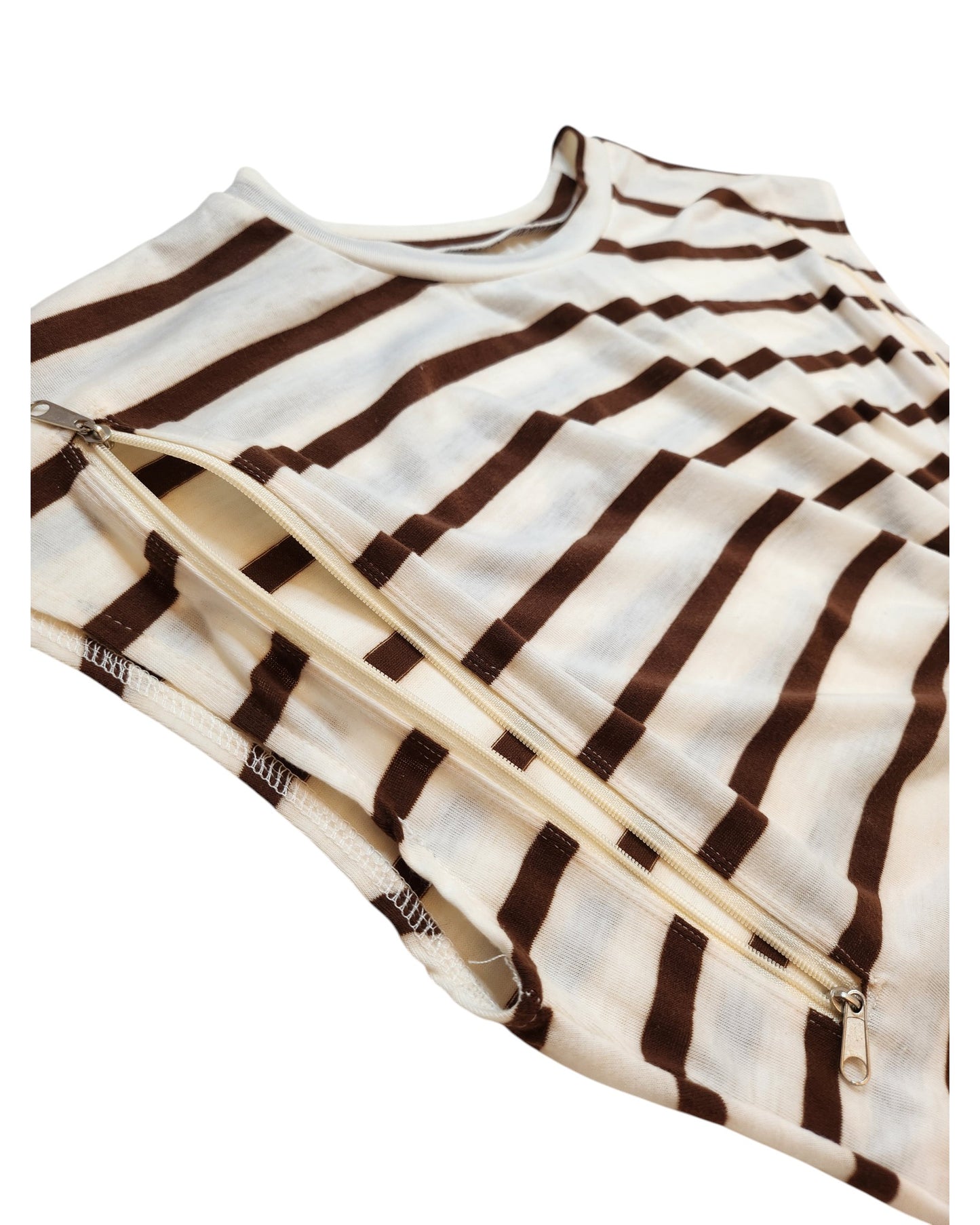 A close-up of TikToks Upcycled Breastfeeding & Pumping Cream/Brown Stripe dress (L), featuring horizontal brown stripes and a diagonal zipper detail near the hem.