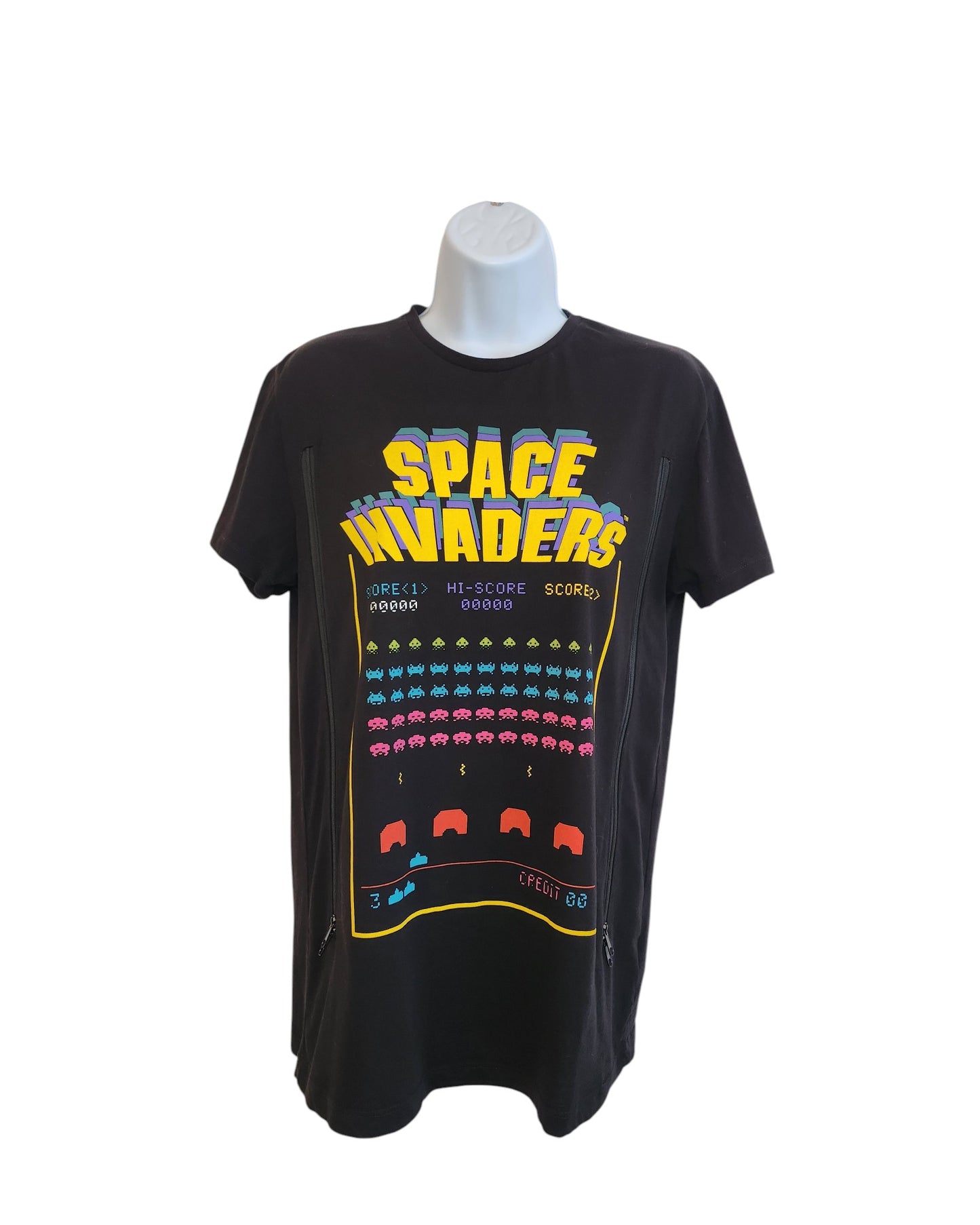 The Cedar Wood State Upcycled Breastfeeding & Pumping Space Invaders t-shirt (M) features a colorful arcade game graphic on eco-friendly fabric, merging sustainable style with easy nursing and pumping access.