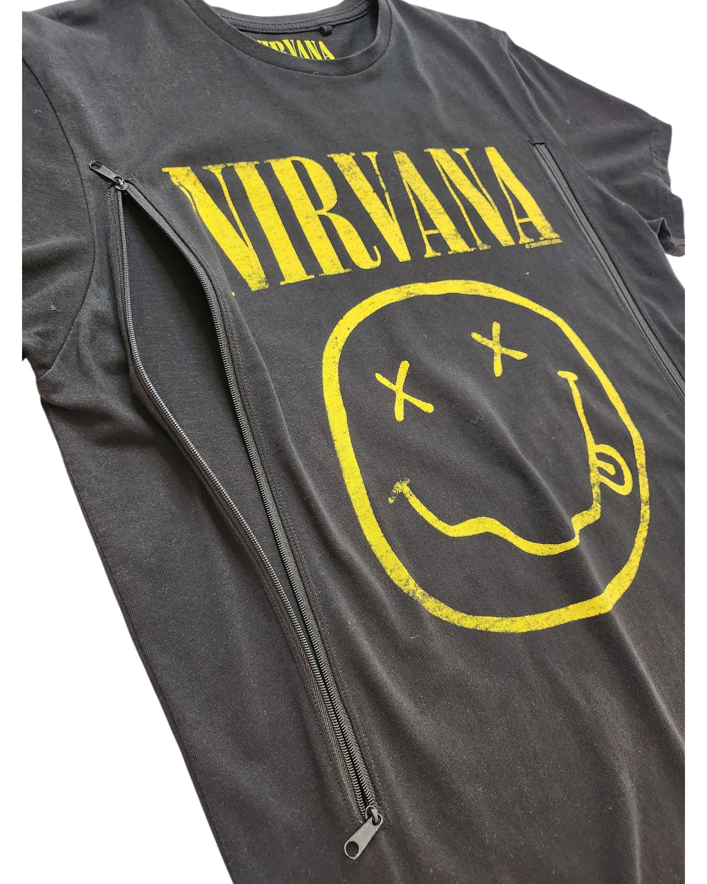 The Cedar Wood State Upcycled Breastfeeding & Pumping Black Yellow Smile Nirvana Band T-shirt (M) features VIRVANA in yellow, a smiley with crossed-out eyes, and diagonal zippers from shoulders for easy nursing access.