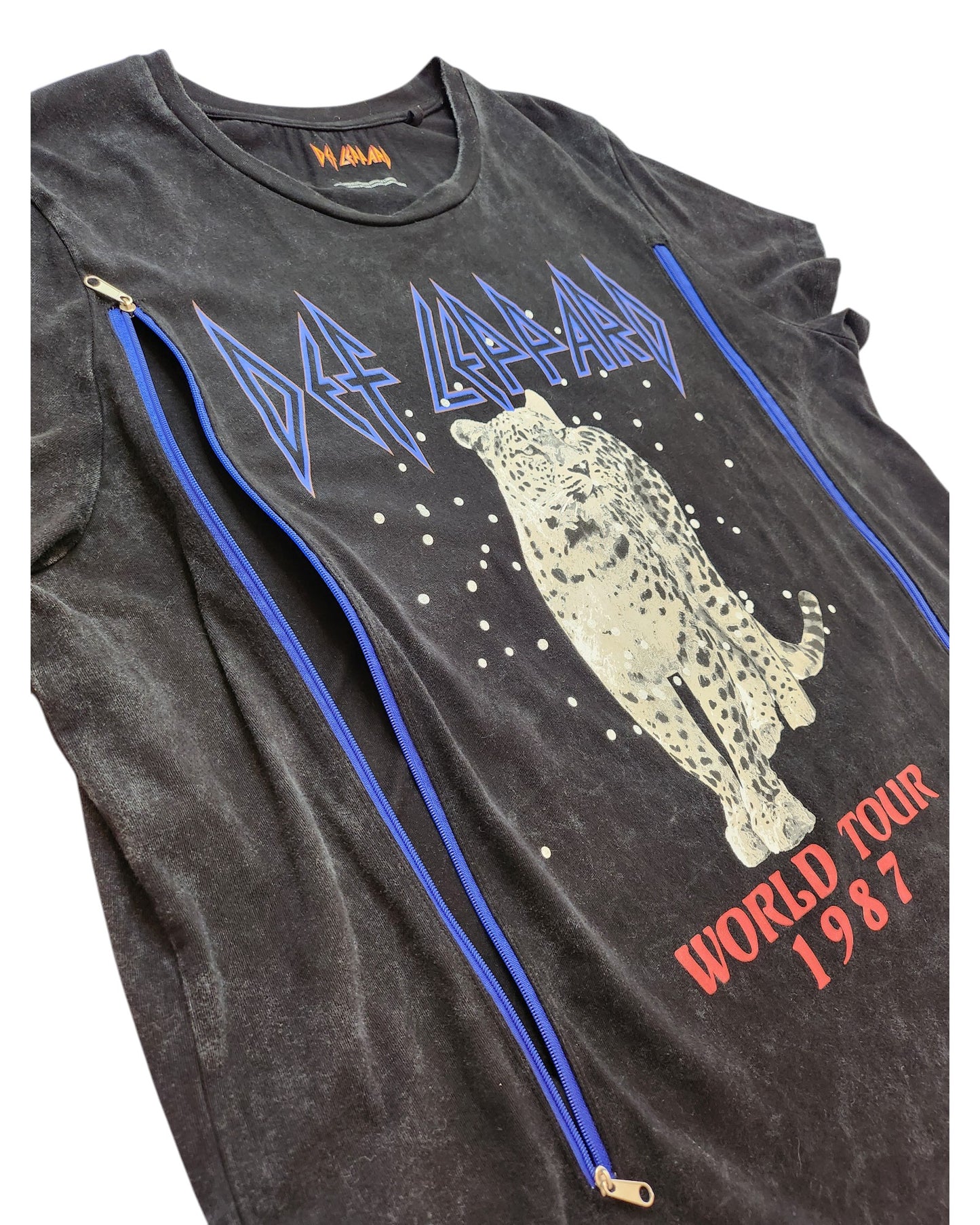 Upcycled Def Leppard Nursing & Pumping Band T-shirt (size L): Black with white leopard graphic, blue logo, red WORLD TOUR 1987 text, and two vertical blue zippers—perfect for preloved fashion fans.