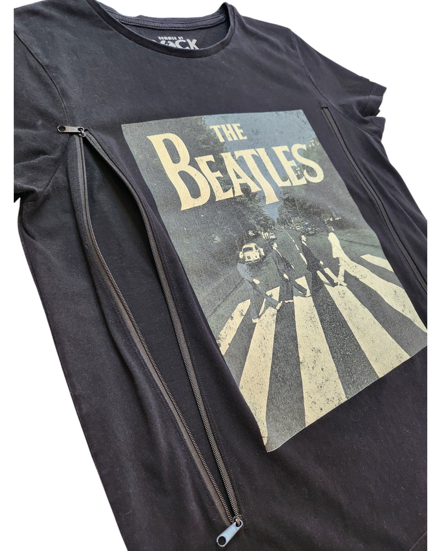 The Summer of Rock Upcycled Breastfeeding & Pumping The Beatles t-shirt UK10 is a black tee with a vintage Abbey Road graphic and two diagonal zippers, offering eco-friendly style and nursing convenience.