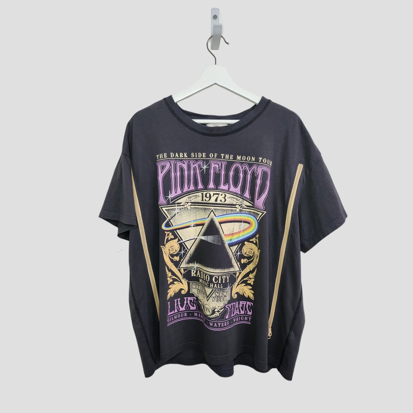 An upcycled H&M Pink Floyd grey rainbow band T-shirt (XL, 100207) for breastfeeding and pumping—perfect for preloved nursing wear fans seeking unique, comfortable style.