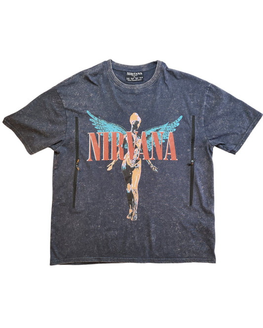 The Upcycled Breastfeeding & Pumping Nirvana t-shirt from touched out mama, in charcoal-gray with a faded angel graphic and NIRVANA text, offers preloved vintage charm for timeless style enthusiasts.
