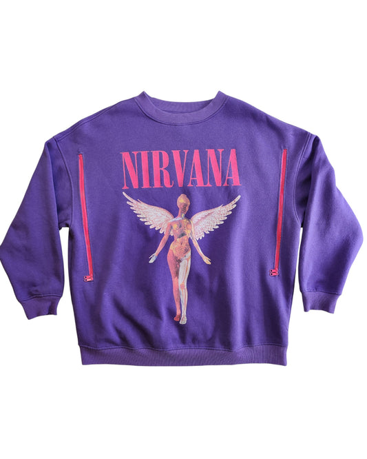 The Upcycled Breastfeeding & Pumping Nirvana Sweatshirt L by touched out mama is a purple piece with NIRVANA in large pink letters, featuring a winged figure with anatomical details and vertical pink zipper designs, offering an eco-friendly alternative with sustainable style.