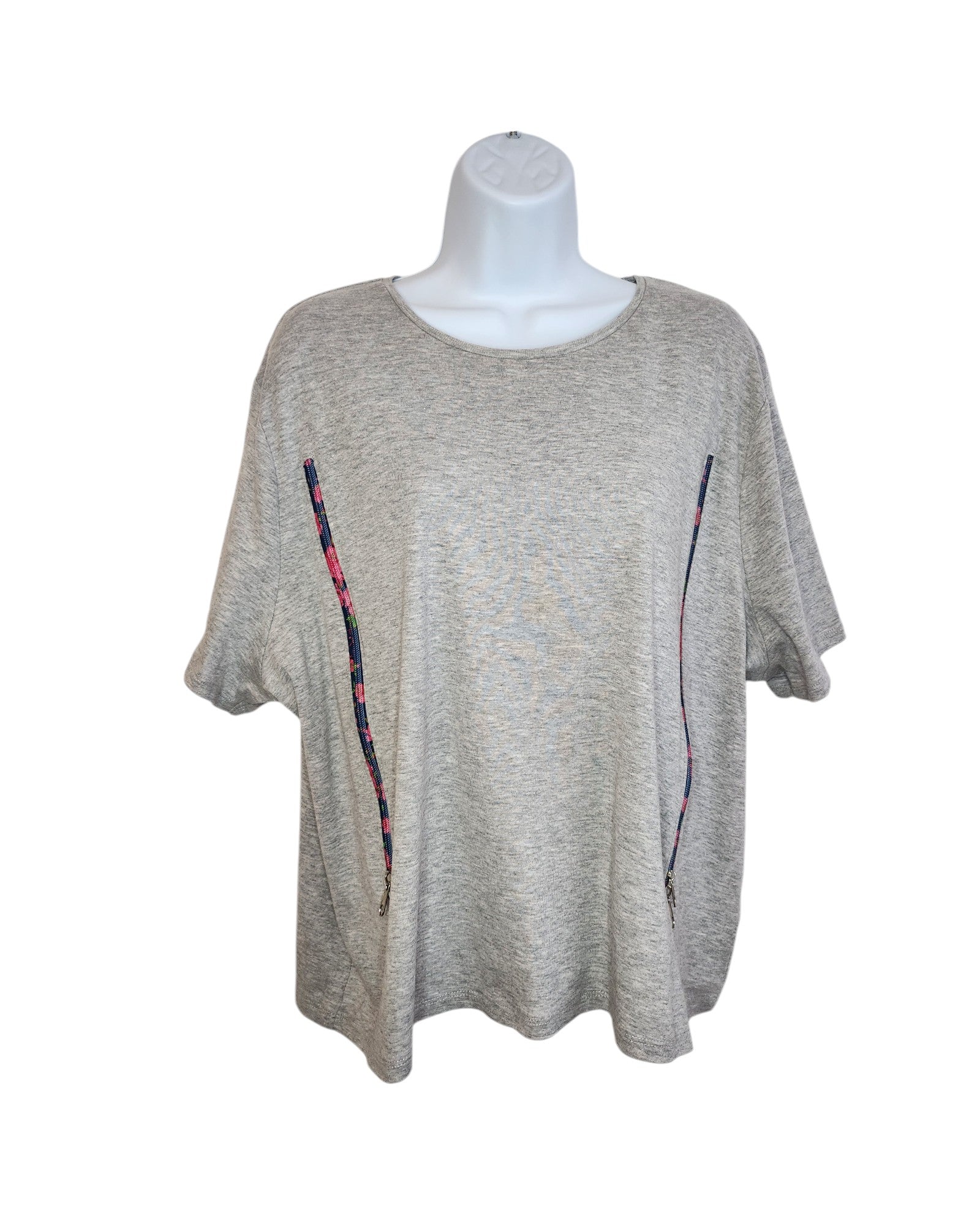 The product is an Upcycled Breastfeeding (Nursing) & Pumping Grey Floral Zips T-shirt UK24 by touched out mama, displayed on a white mannequin. It features subtly charming colorful vertical stripes and multicolored lines from the bottom to the chest, highlighting its unique upcycled design.