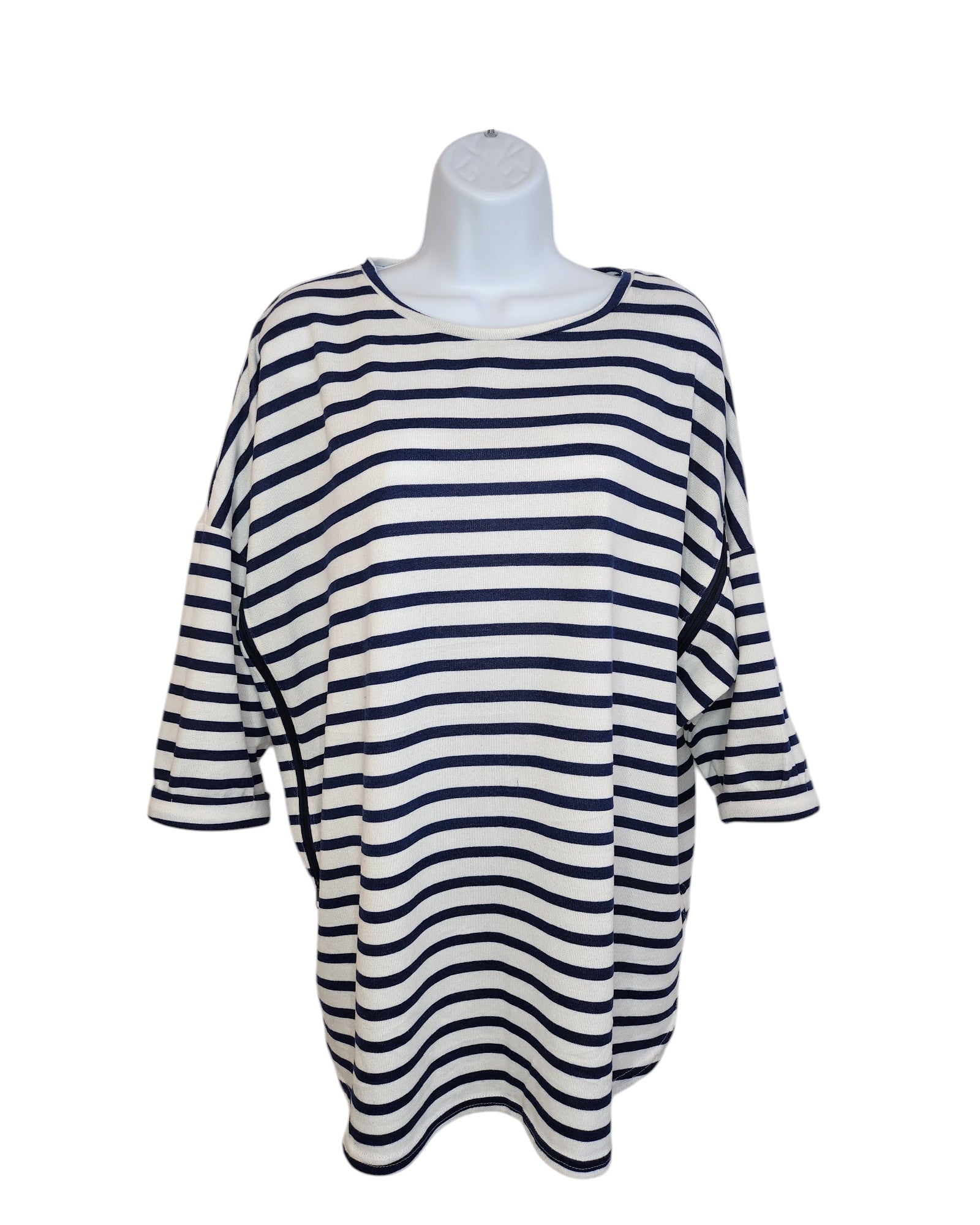 The preloved Upcycled Breastfeeding & Pumping Stripe Knit Top L by touched out mama is showcased on a white mannequin torso. This black and white top boasts three-quarter sleeves, a relaxed fit, and classic horizontal stripes for everyday comfort.