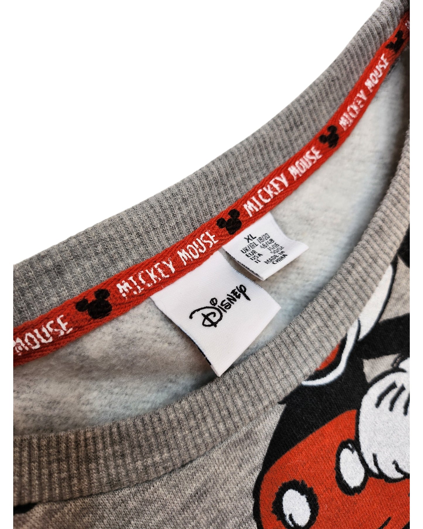 The Upcycled Breastfeeding & Pumping Mickey Mouse Disney Sweatshirt XL by touched out mama is an eco-friendly fashion choice. It features a gray design with a Mickey Mouse pattern, a red-trimmed neckline with text and icons, and inside branding to ensure magic while caring for the planet.