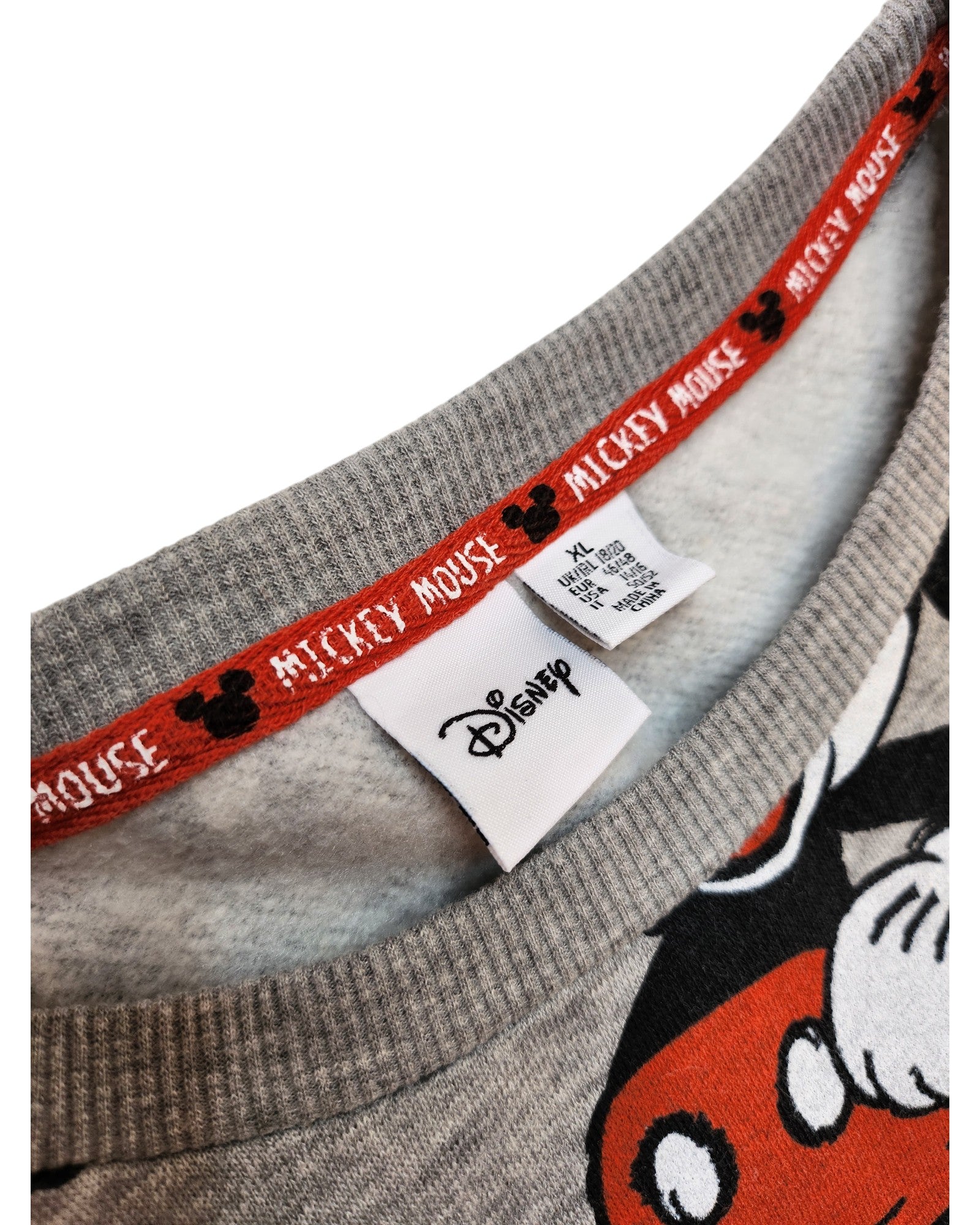 The Upcycled Breastfeeding & Pumping Mickey Mouse Disney Sweatshirt XL by touched out mama is an eco-friendly fashion choice. It features a gray design with a Mickey Mouse pattern, a red-trimmed neckline with text and icons, and inside branding to ensure magic while caring for the planet.