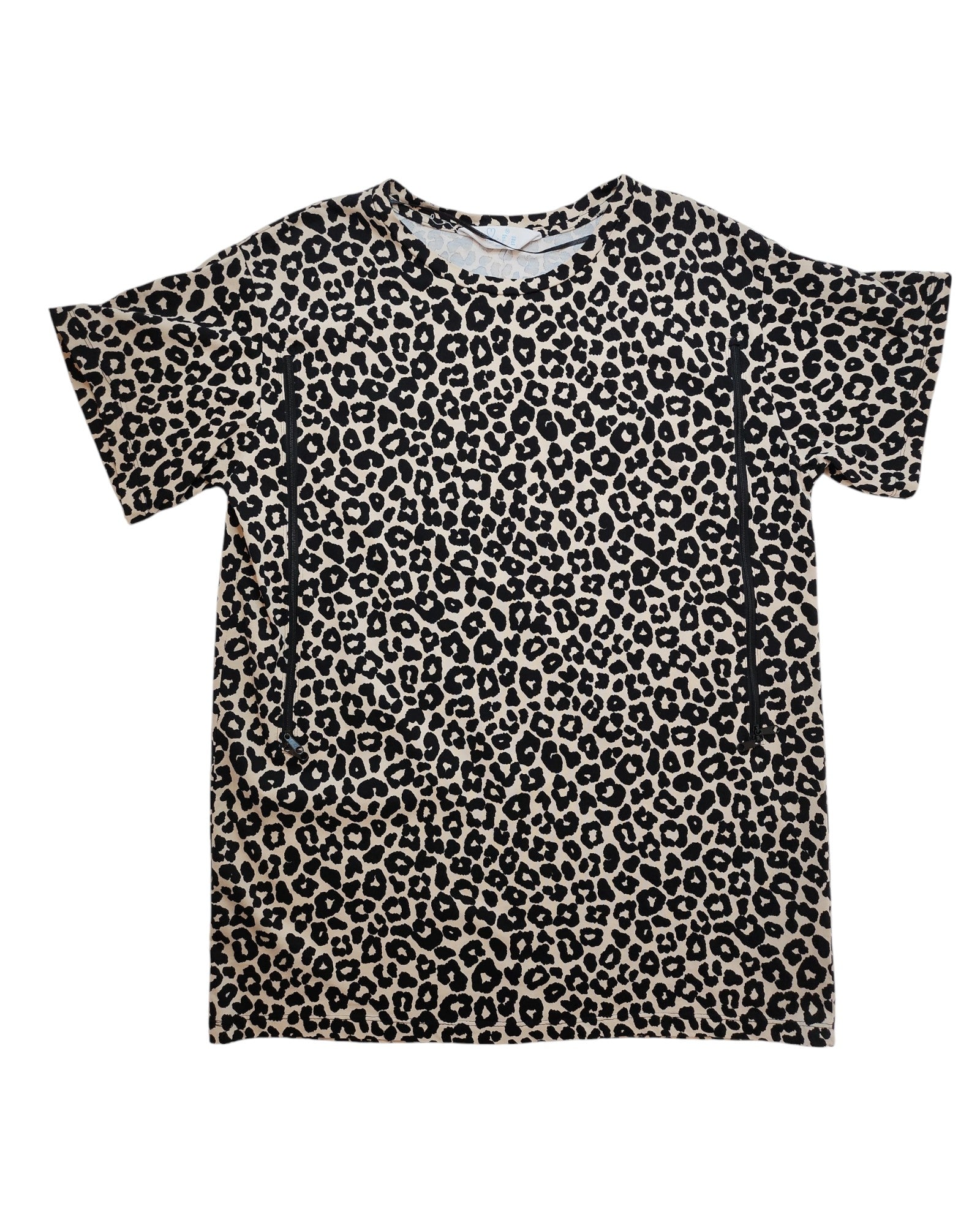The Upcycled Breastfeeding & Pumping Leopard T-shirt M by touched out mama features a beige background with black spots, crafted from upcycled clothing. It offers a casual, relaxed fit with short sleeves and a crew neckline, merging style with eco-friendly fashion.
