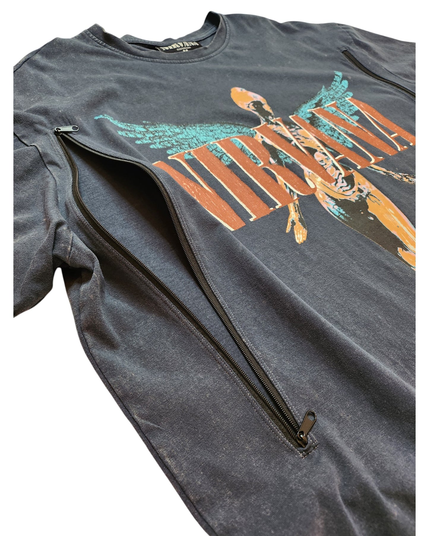 The Upcycled Breastfeeding & Pumping Nirvana Oversized T-Shirt M from touched out mama is a dark t-shirt made from upcycled clothing, featuring a human anatomical figure with wings. Two black zippers diagonally adorn the front, with NIRVANA prominently above for an eco-friendly fashion statement.