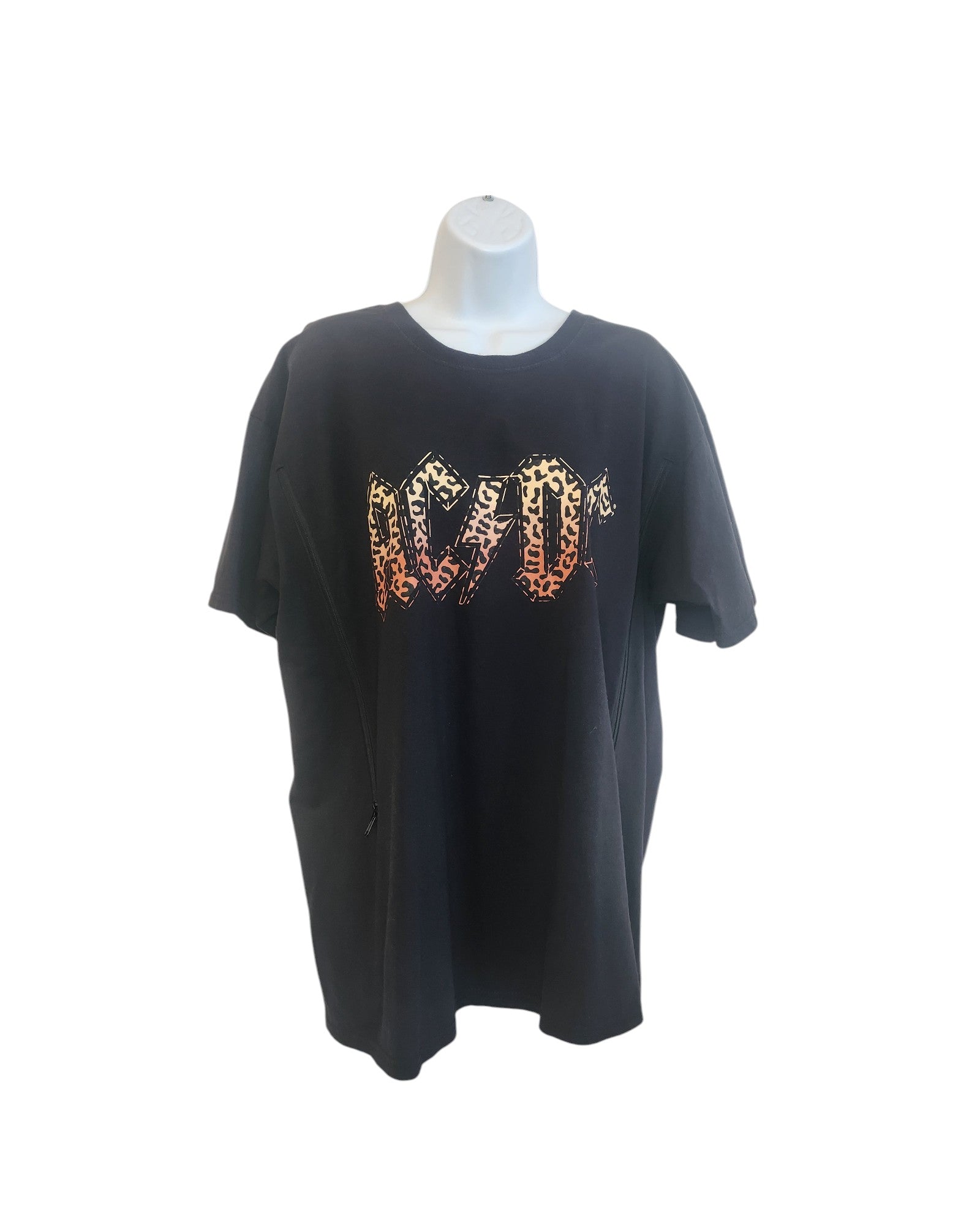Displayed on the mannequin is a preloved fashion black T-shirt by touched out mama, featuring an upcycled XL AC DC design with striking leopard photo patterns.